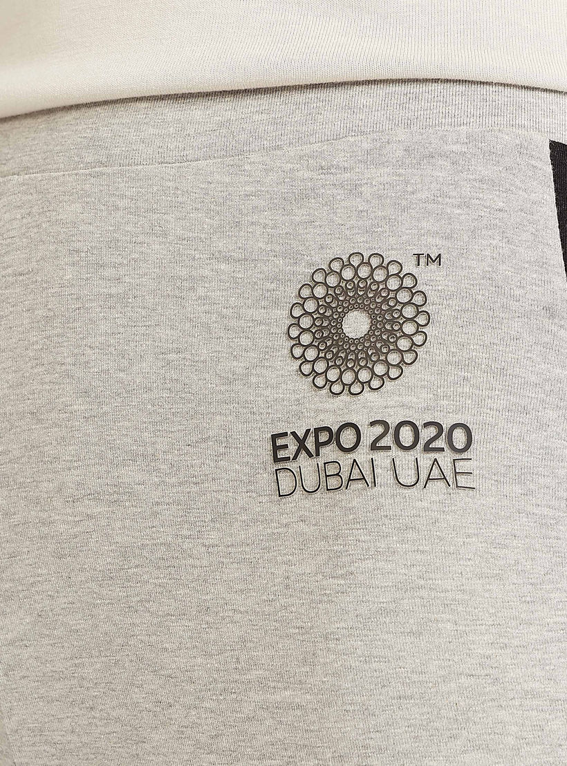 بنطلون ليقنز بخصر مطّاطي متوسط الارتفاع بطبعات إكسبو 2020-women-clothing-bottoms-leggings-image-3