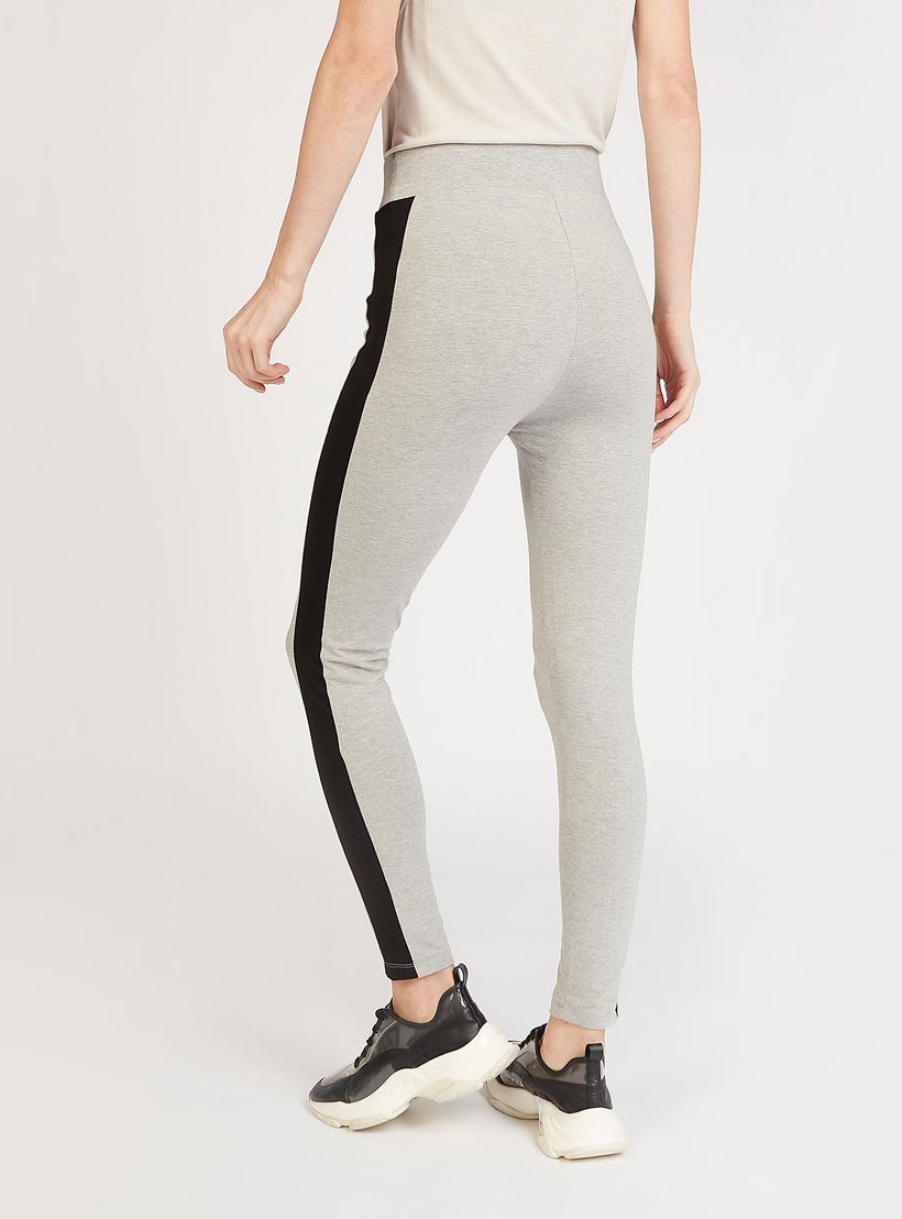 بنطلون ليقنز بخصر مطّاطي متوسط الارتفاع بطبعات إكسبو 2020-women-clothing-bottoms-leggings-image-4