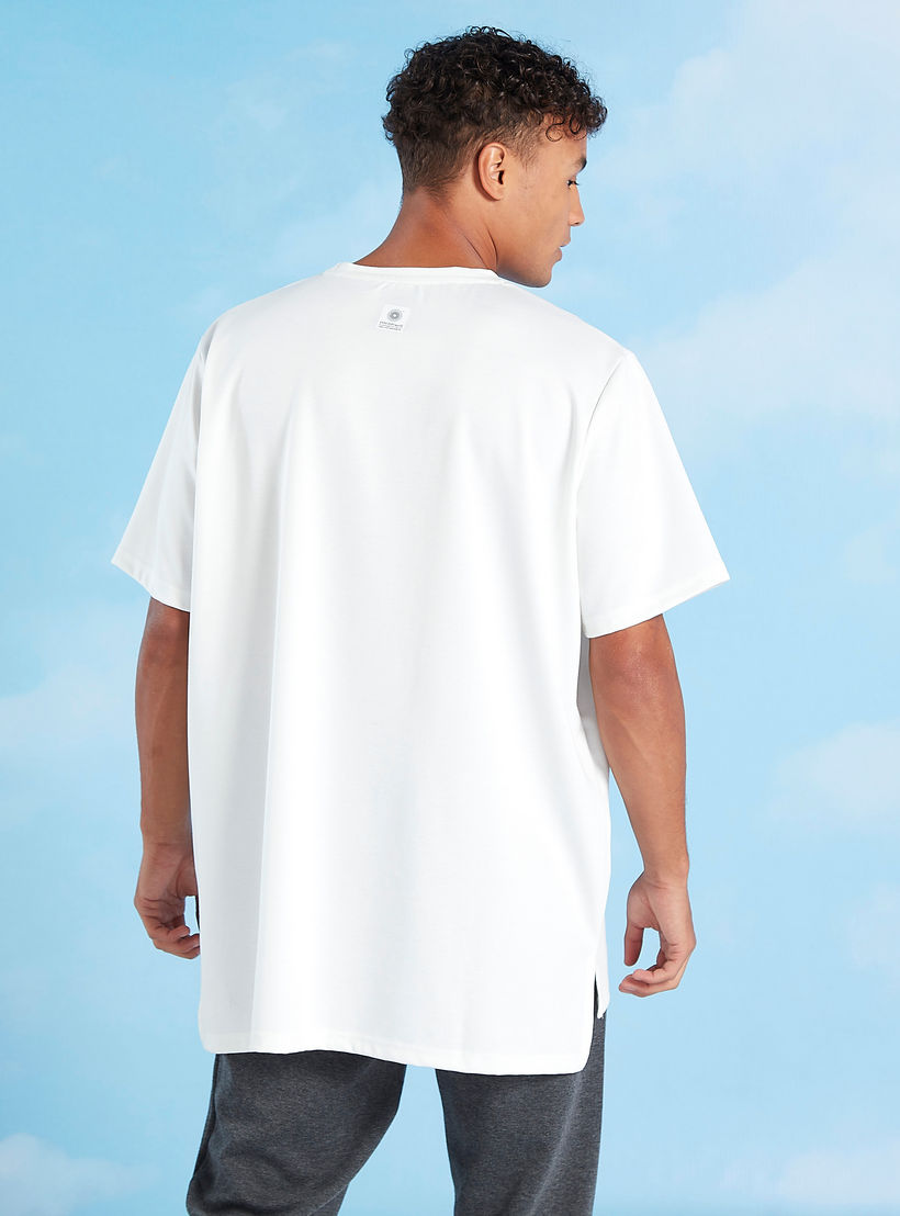 تيشيرت بطبعات وياقة ضيّقة وأكمام قصيرة إكسبو 2020-men-clothing-sportswearandactivewear-tshirtsandpolos-image-1