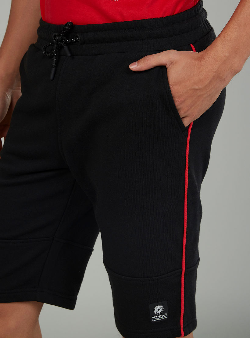 شورت سادة بخصر متوسط الارتفاع ورباط وجيوب إكسبو 2020-men-clothing-sportswearandactivewear-bottoms-image-3