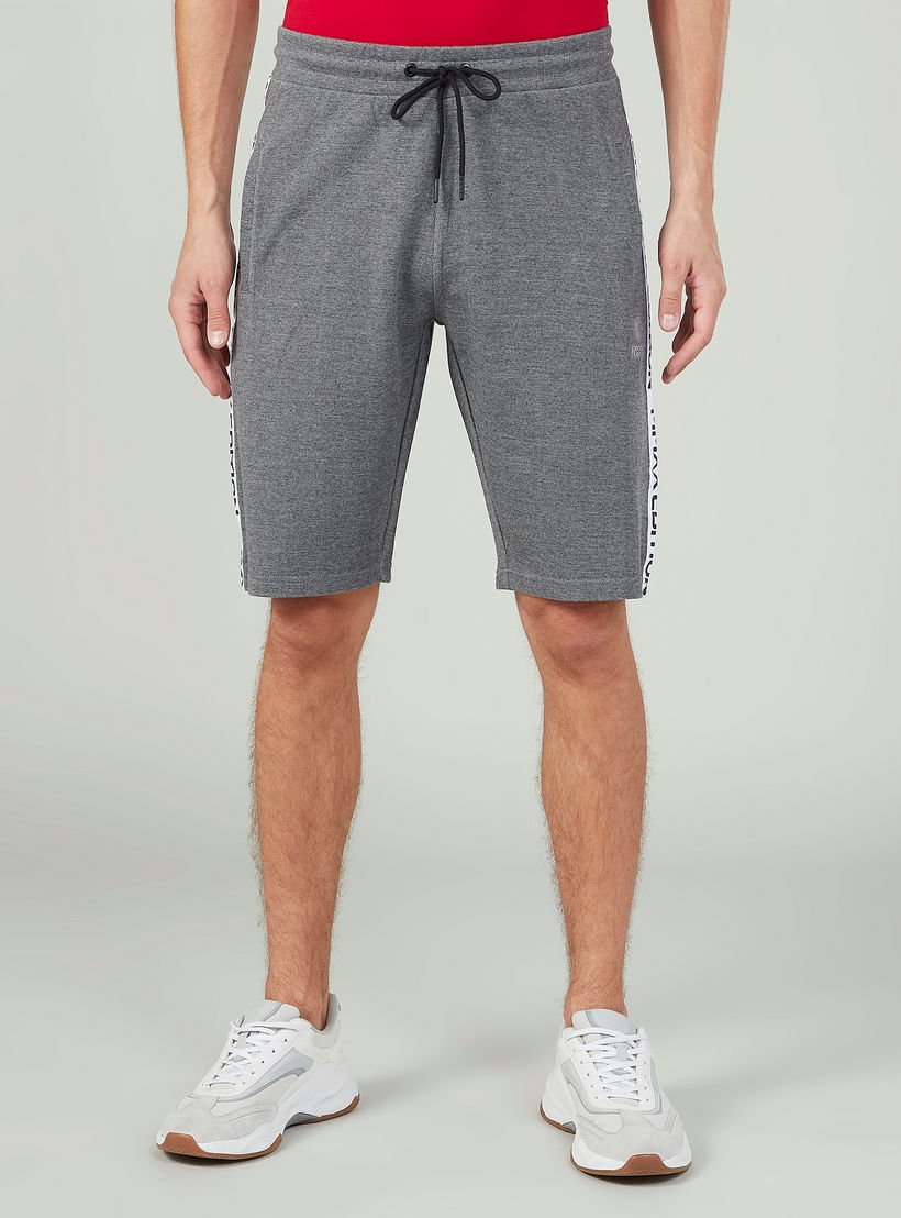 شورت سادة برباط وشريطة إكسبو 2020-men-clothing-sportswearandactivewear-bottoms-image-1