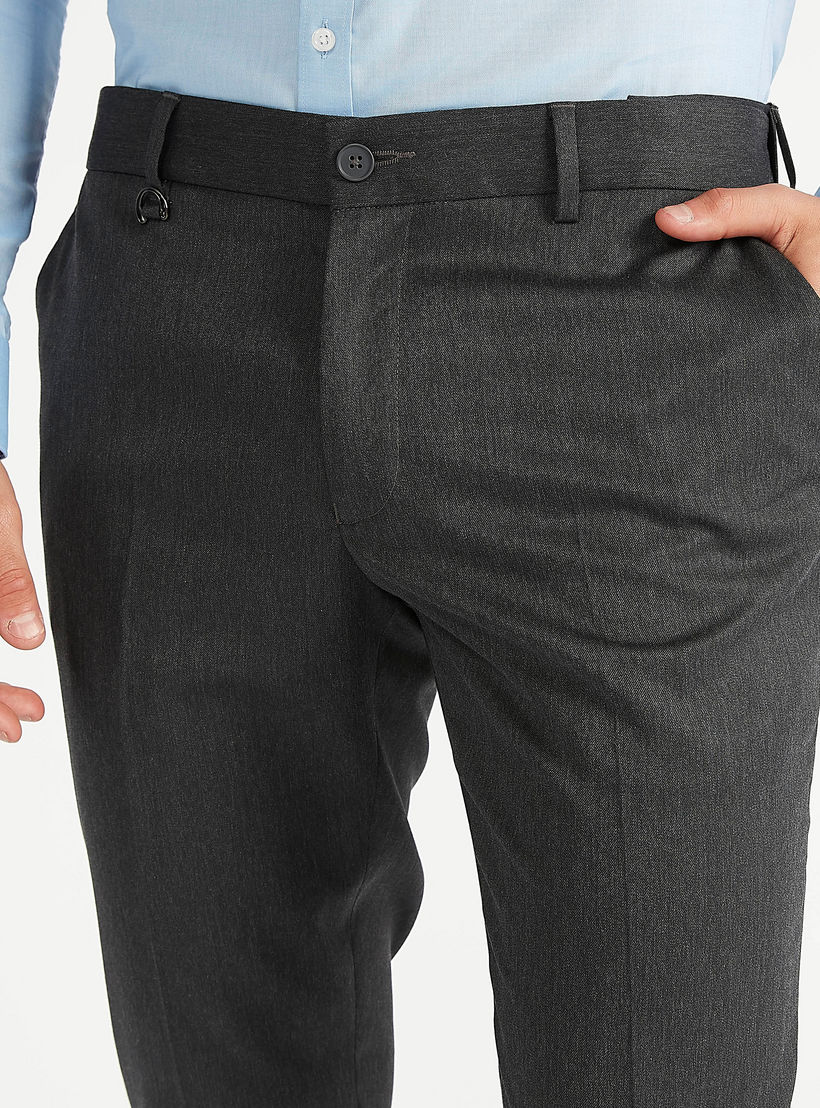 بنطلون سادة سكيني فيت بخصر متوسط الإرتفاع وتفاصيل جيوب وعراوي حزام-men-clothing-bottoms-trousersandchinos-trousers-image-3