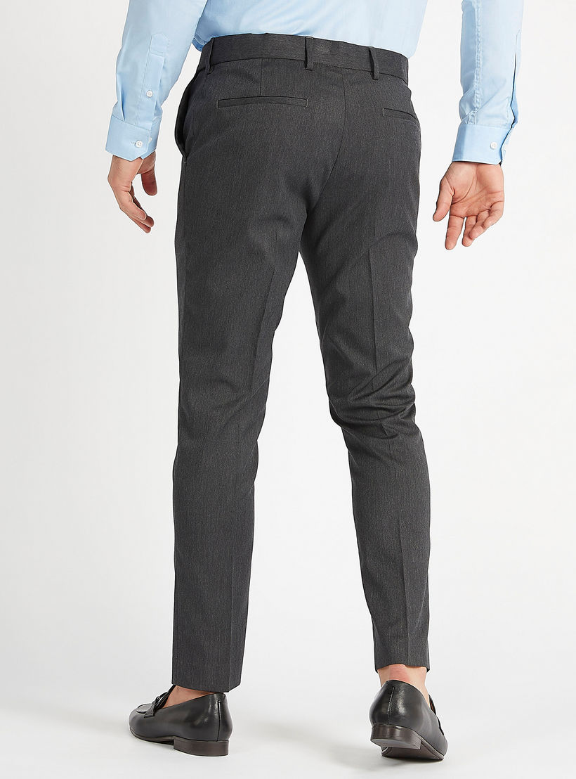 بنطلون سادة سكيني فيت بخصر متوسط الإرتفاع وتفاصيل جيوب وعراوي حزام-men-clothing-bottoms-trousersandchinos-trousers-image-4