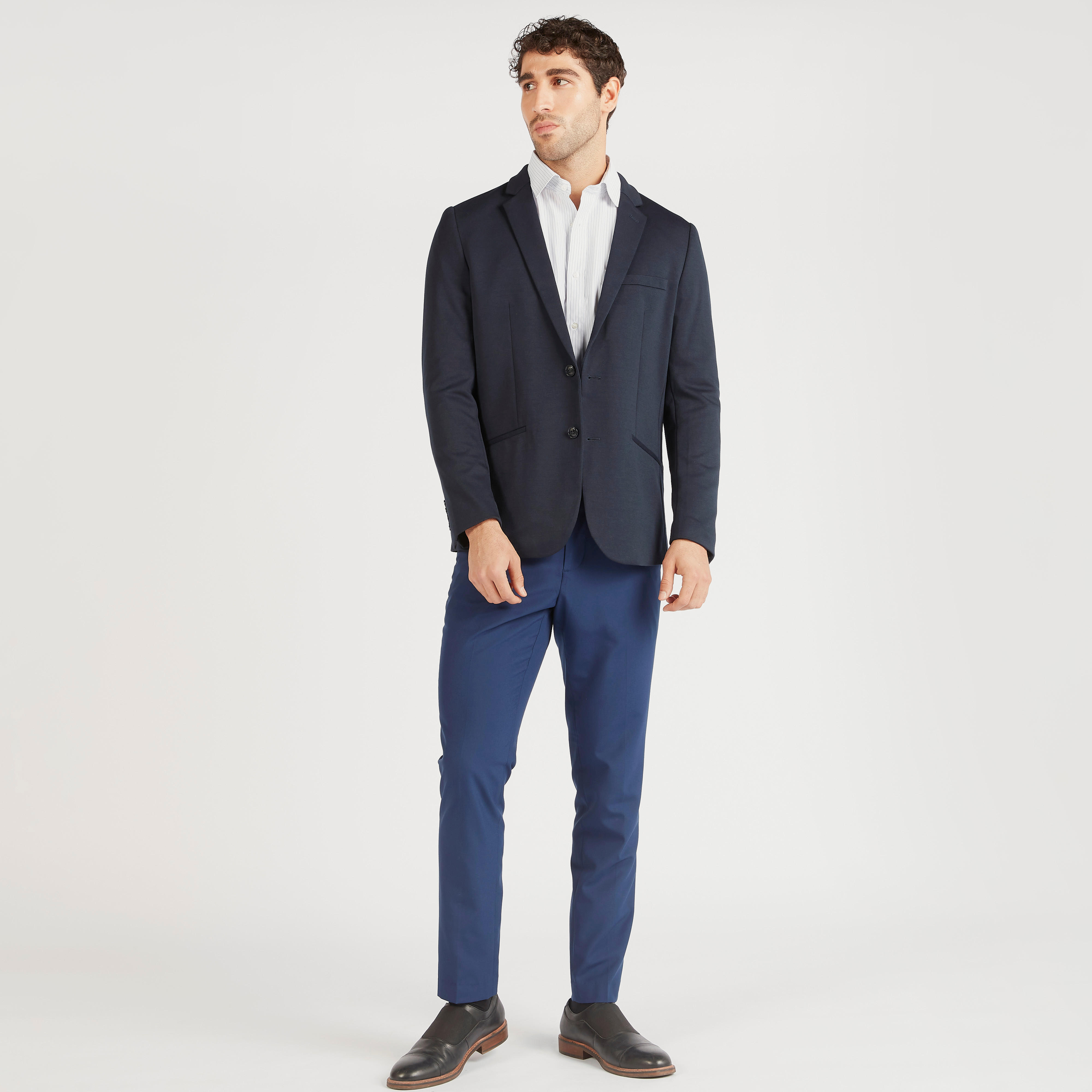 بنطلون سادة بخصر متوسّط الارتفاع وزر إغلاق وجيوب-men-clothing-bottoms-trousersandchinos-trousers-image-3