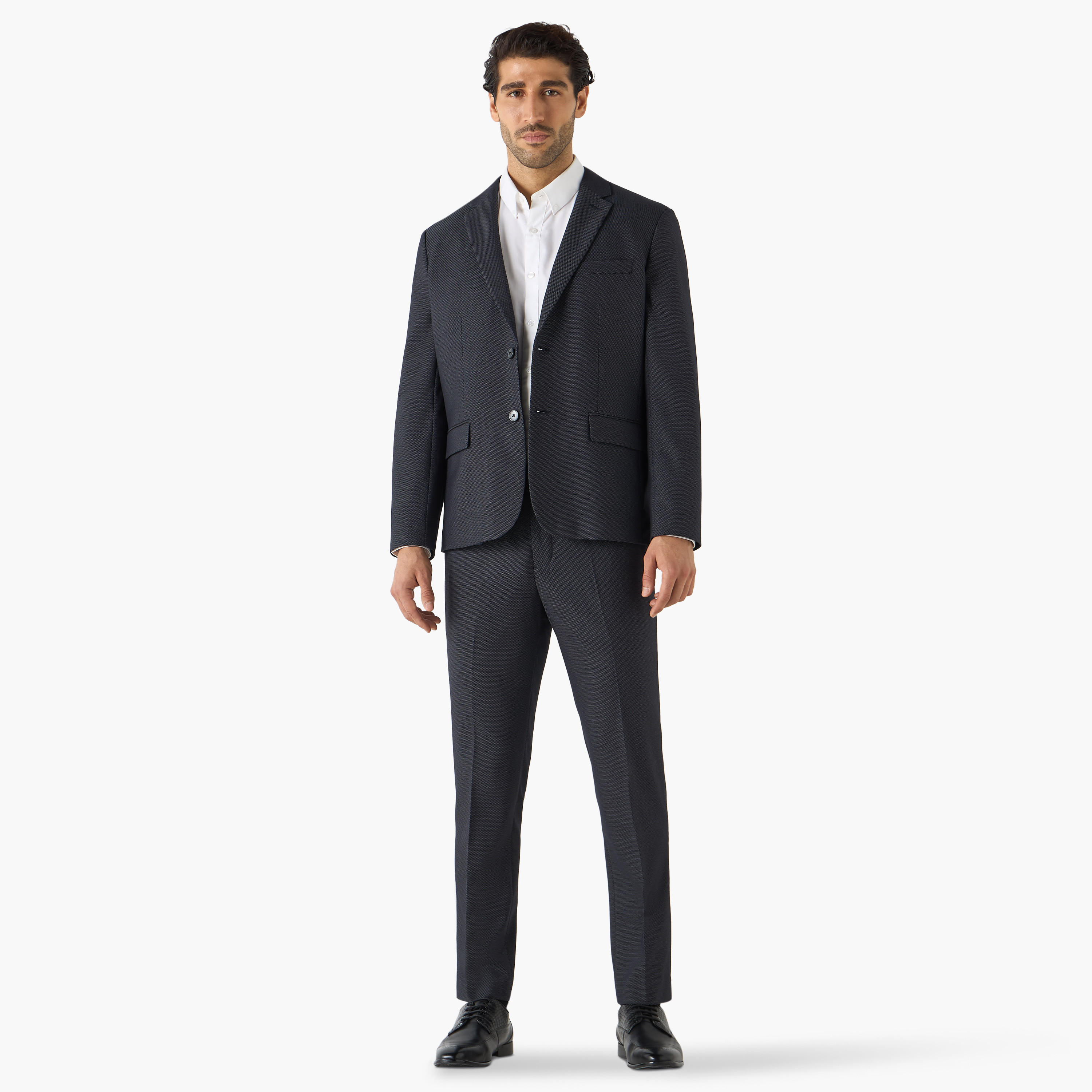 بنطلون بقصّة عادية وخصر مرن وجيوب-men-clothing-bottoms-trousersandchinos-trousers-image-2