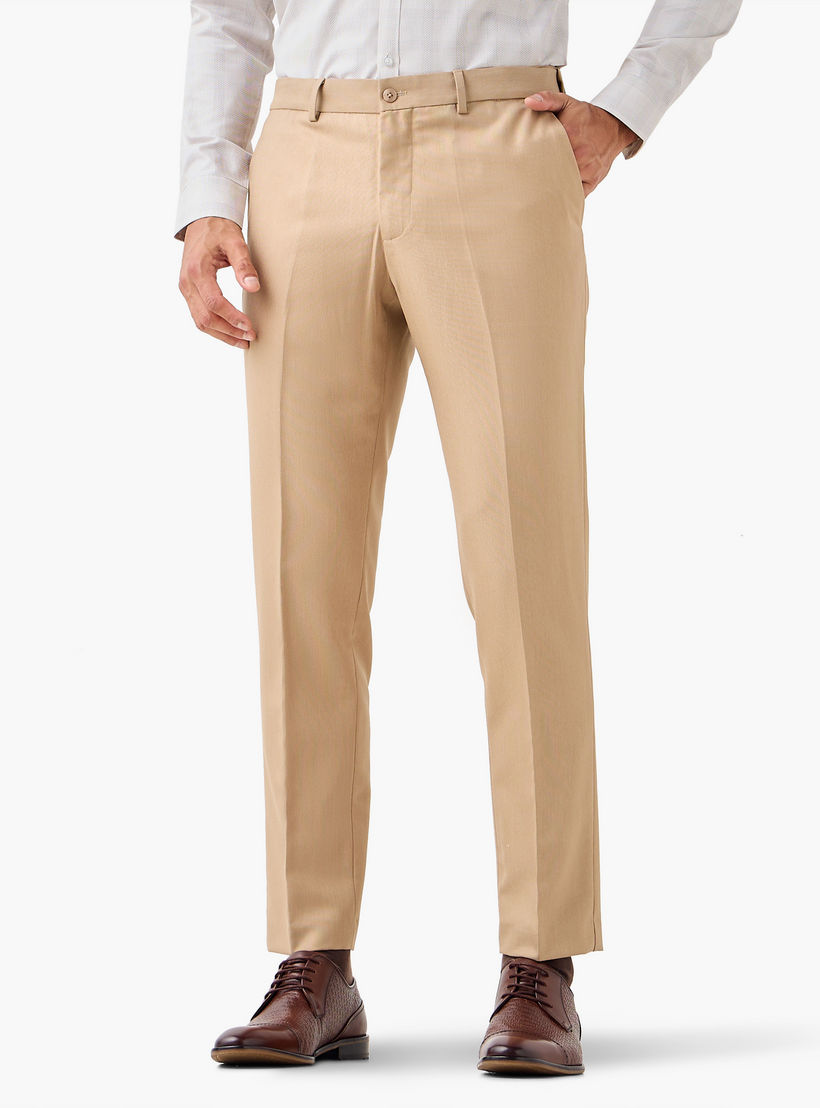 بنطلون رسمي بقصة ضيقة وخصر مرن وجيوب-men-clothing-bottoms-trousersandchinos-trousers-image-1