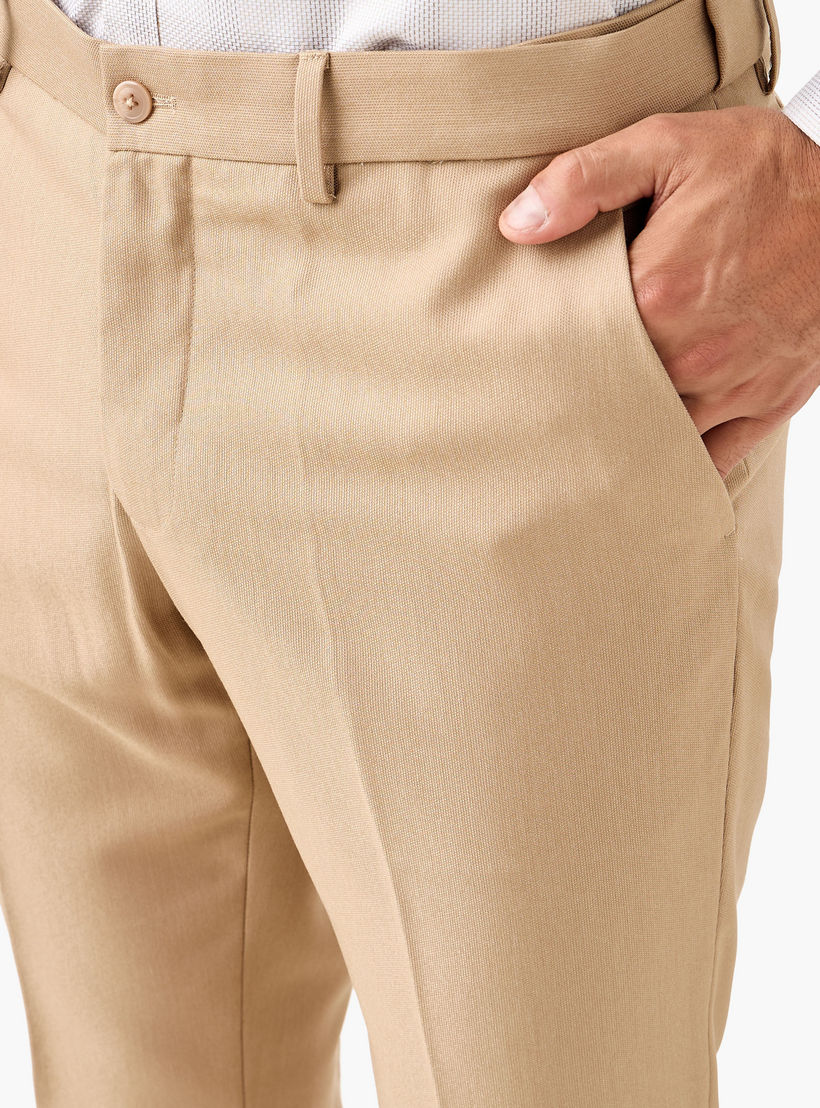 بنطلون رسمي بقصة ضيقة وخصر مرن وجيوب-men-clothing-bottoms-trousersandchinos-trousers-image-4