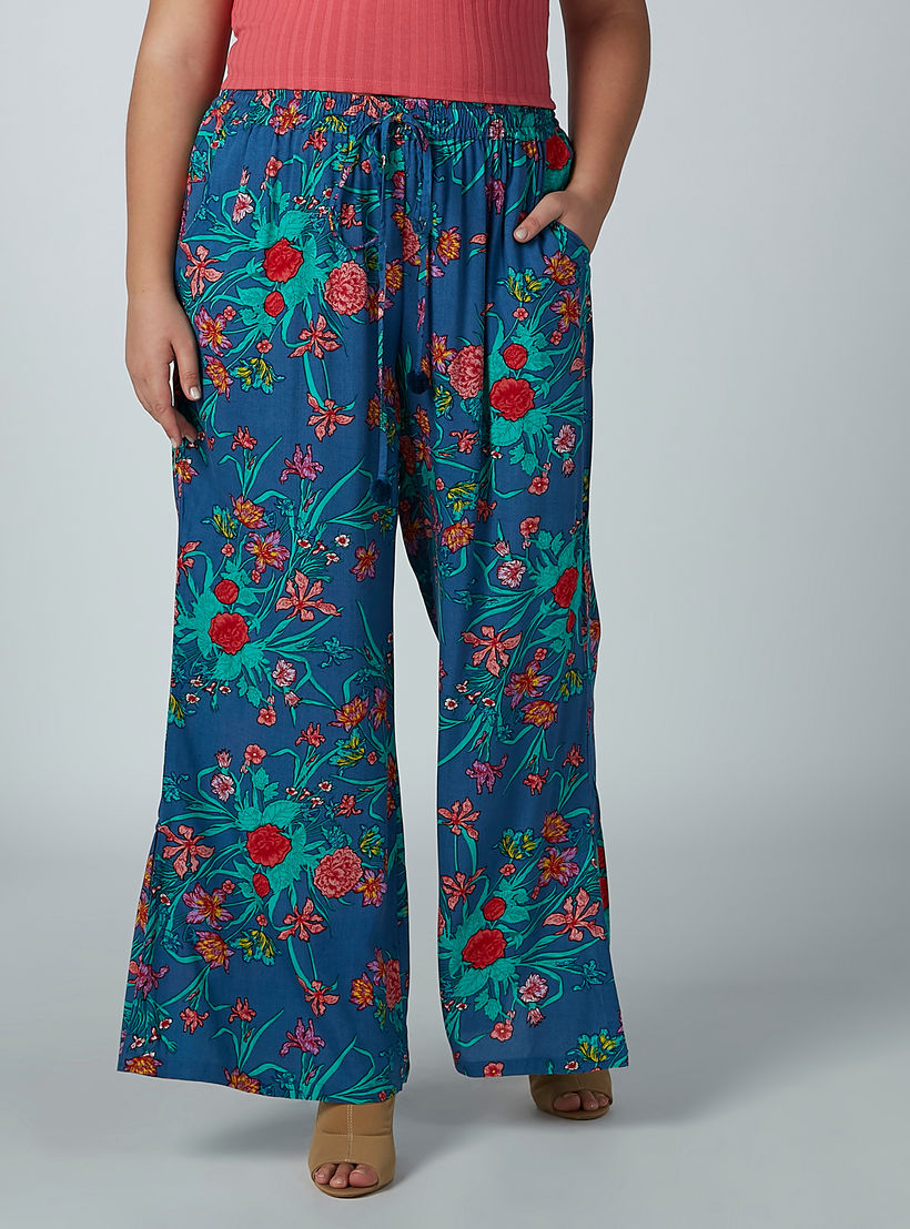 بنطال بالازو بطبعات زهرية وخصر مطاطي وجيوب-women-clothing-bottoms-trousers-image-1