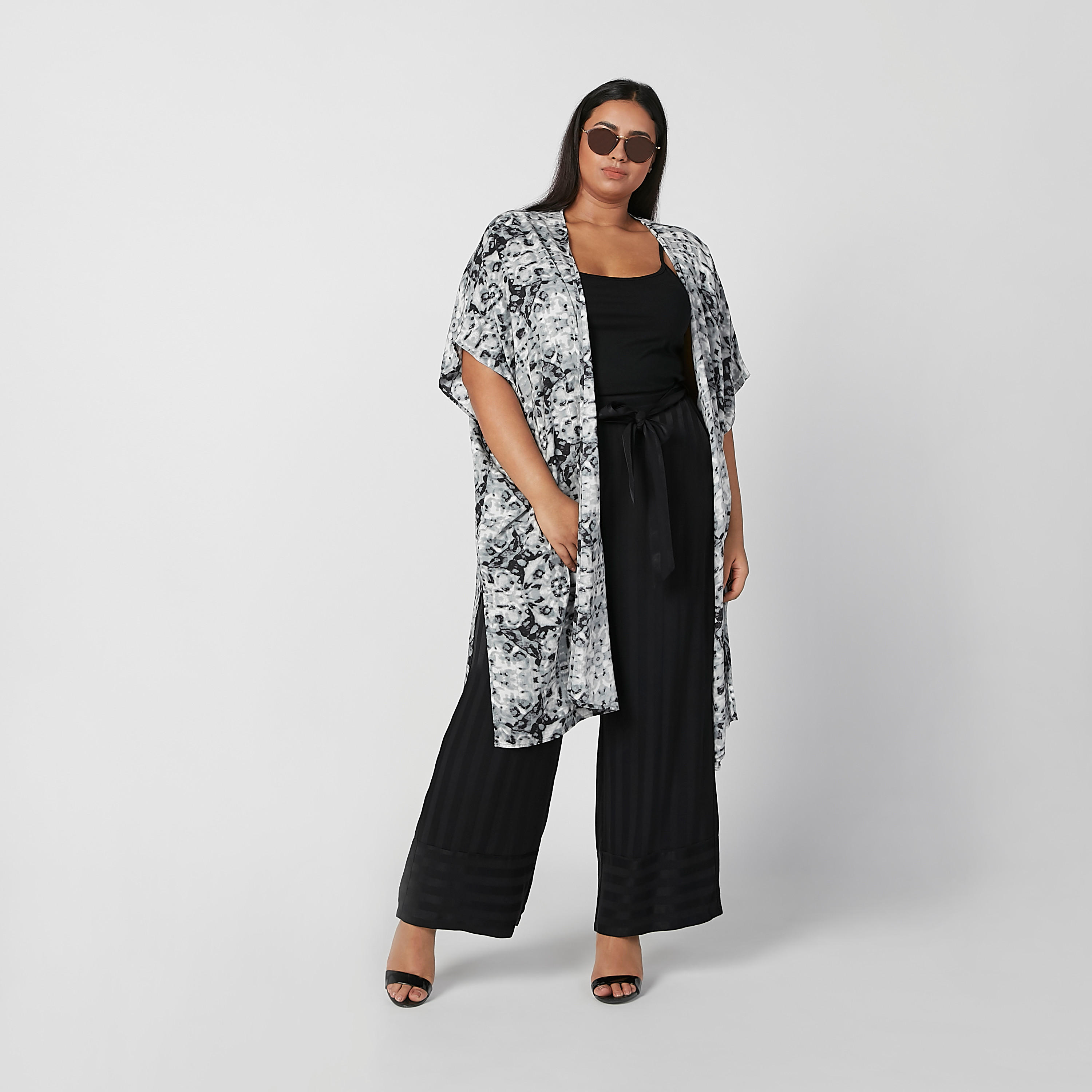 سترة طويلة بقصّة واسعة وأكمام متصلة وطبعات-women-winterwear-cardigansandjumpers-cardigans-image-1