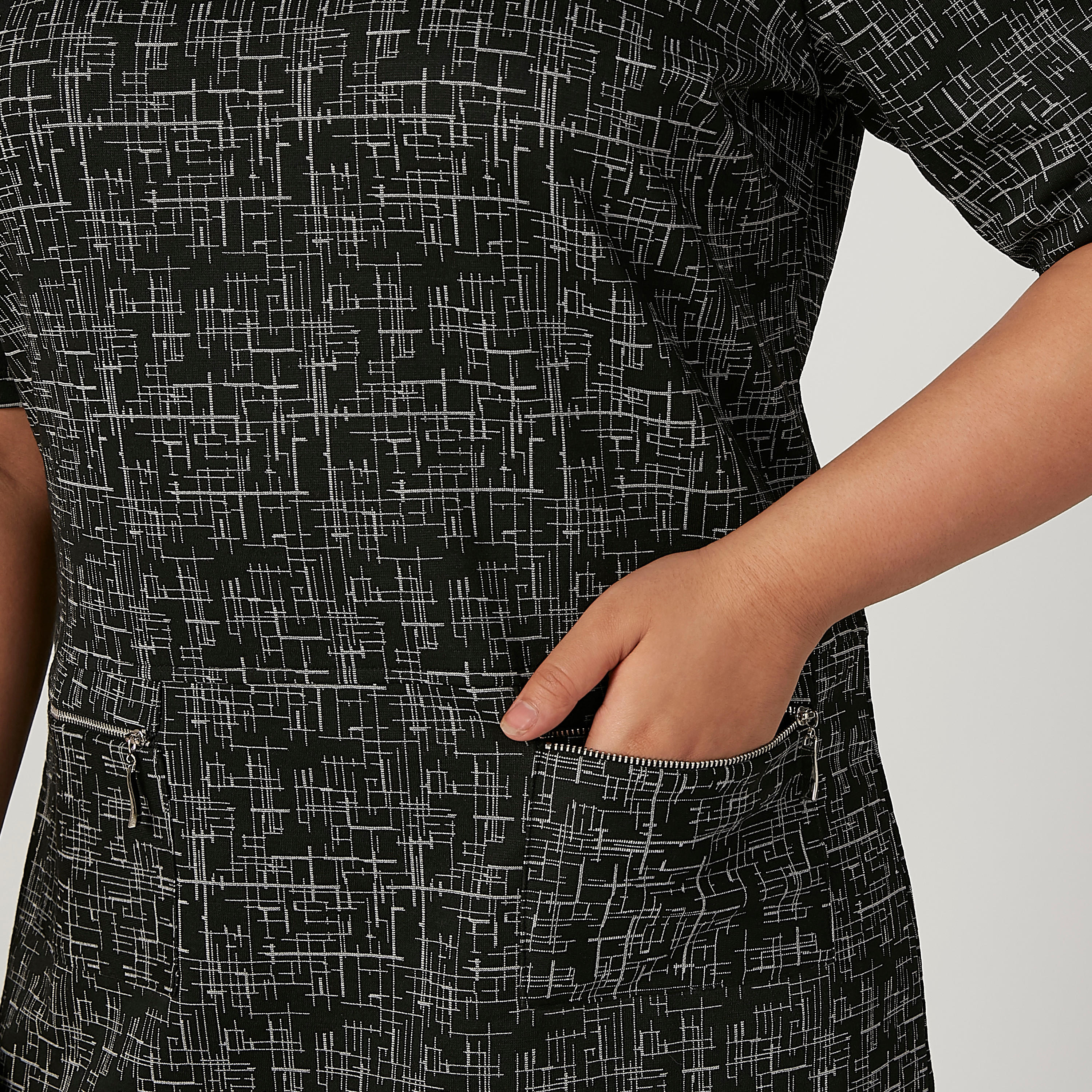 فستان ميدي واسع  بأكمام قصيرة وتفاصيل جيوب بطبعات-women-clothing-dresses-image-3