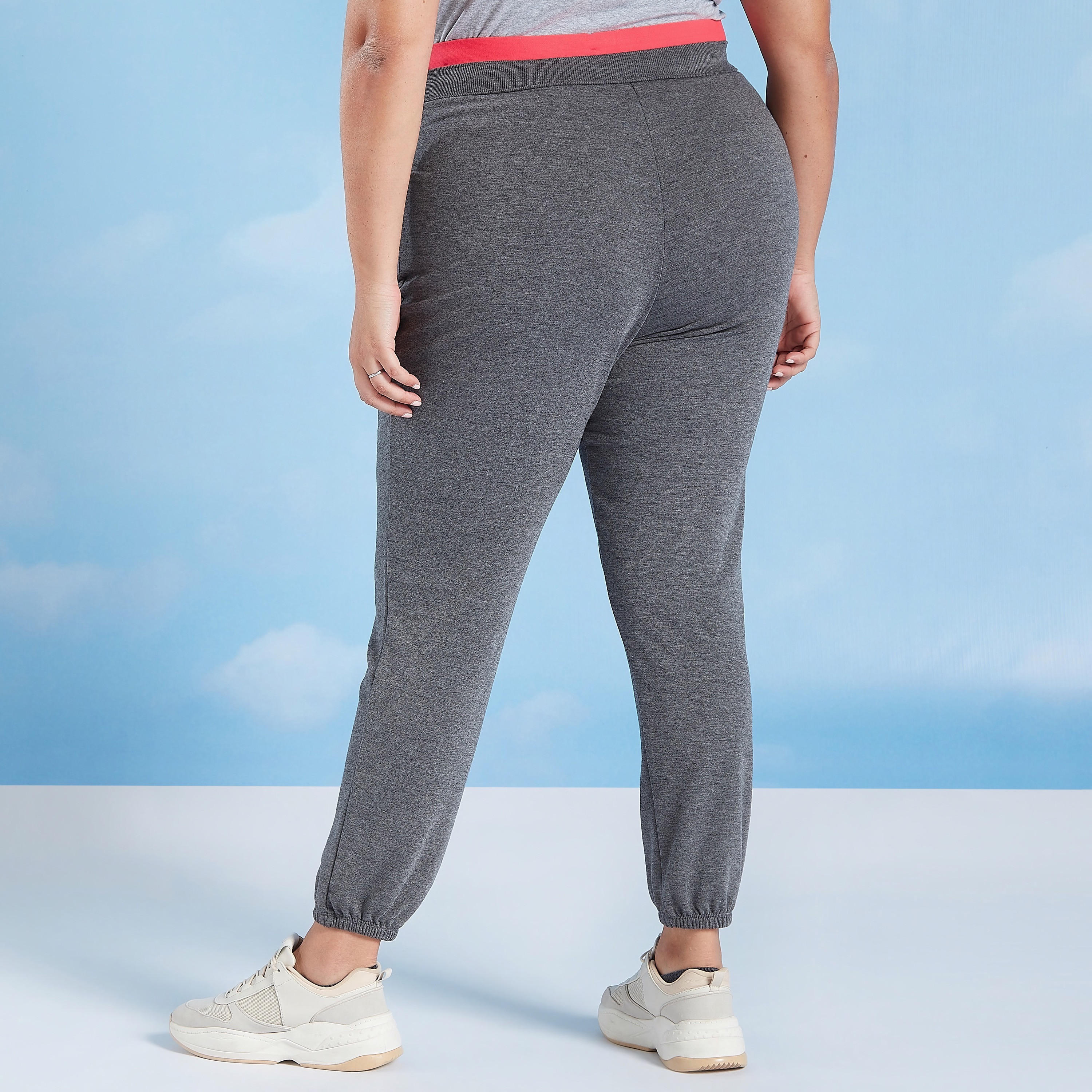 بنطلون رياضي طويل سادة بخصر متوسط الارتفاع وجيوب-women-clothing-bottoms-joggers-image-4
