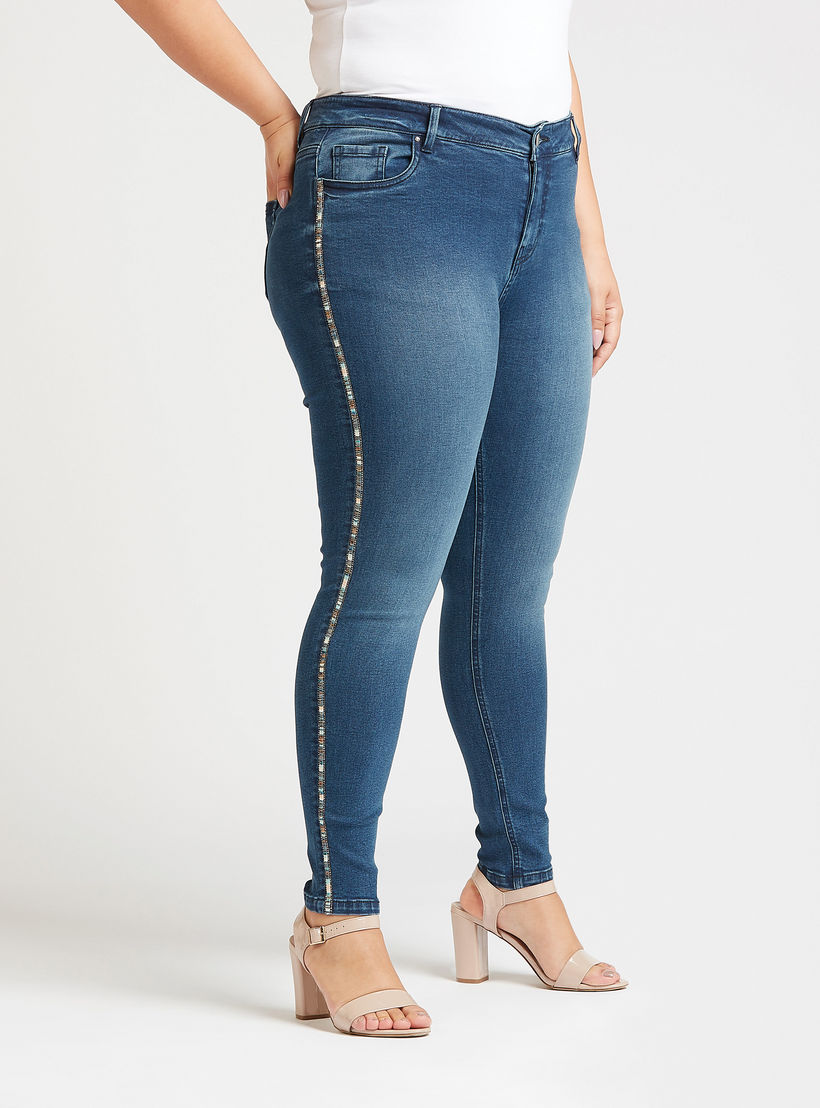 بنطلون جينز سكيني سادة بخصر متوسط الارتفاع بجيوب وزخارف-women-clothing-bottoms-jeans-image-1