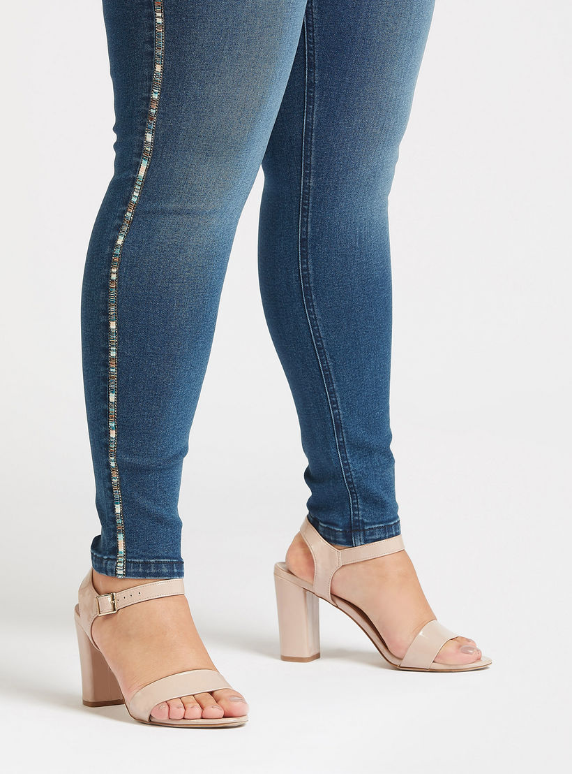 بنطلون جينز سكيني سادة بخصر متوسط الارتفاع بجيوب وزخارف-women-clothing-bottoms-jeans-image-3