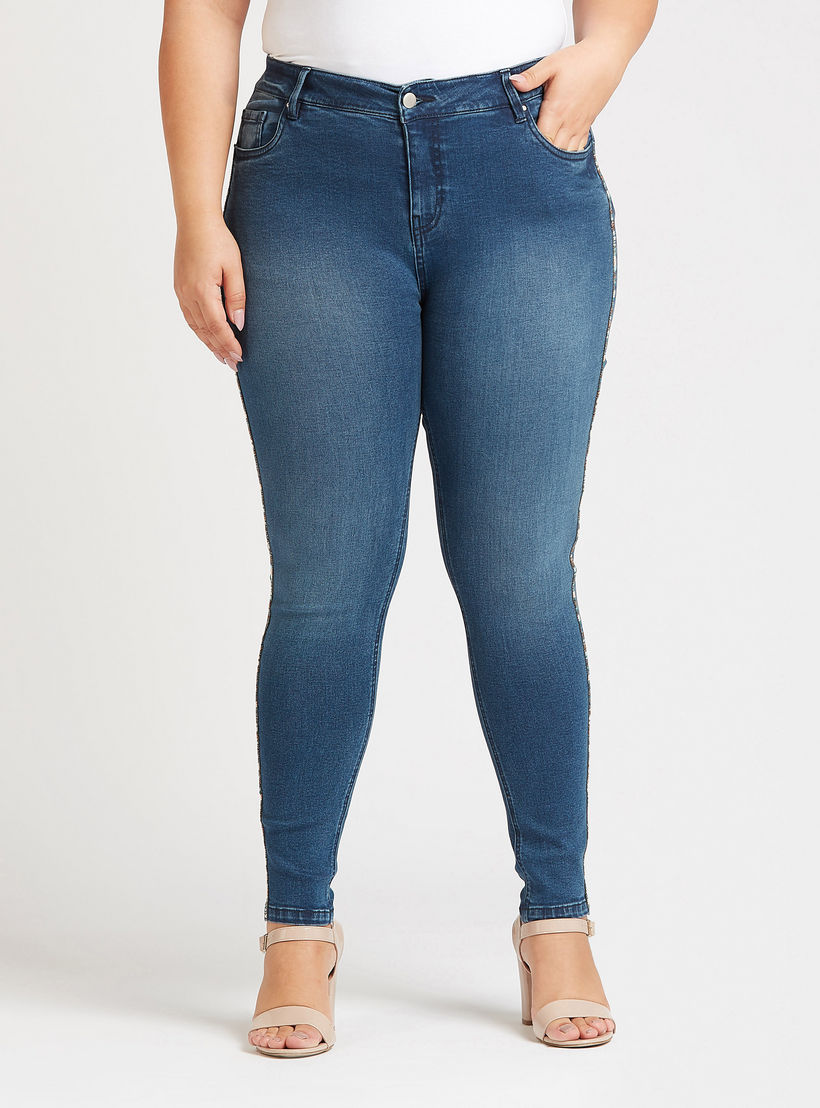 بنطلون جينز سكيني سادة بخصر متوسط الارتفاع بجيوب وزخارف-women-clothing-bottoms-jeans-image-4