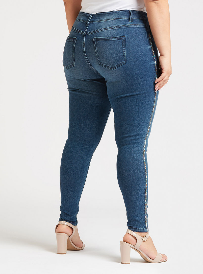 بنطلون جينز سكيني سادة بخصر متوسط الارتفاع بجيوب وزخارف-women-clothing-bottoms-jeans-image-5