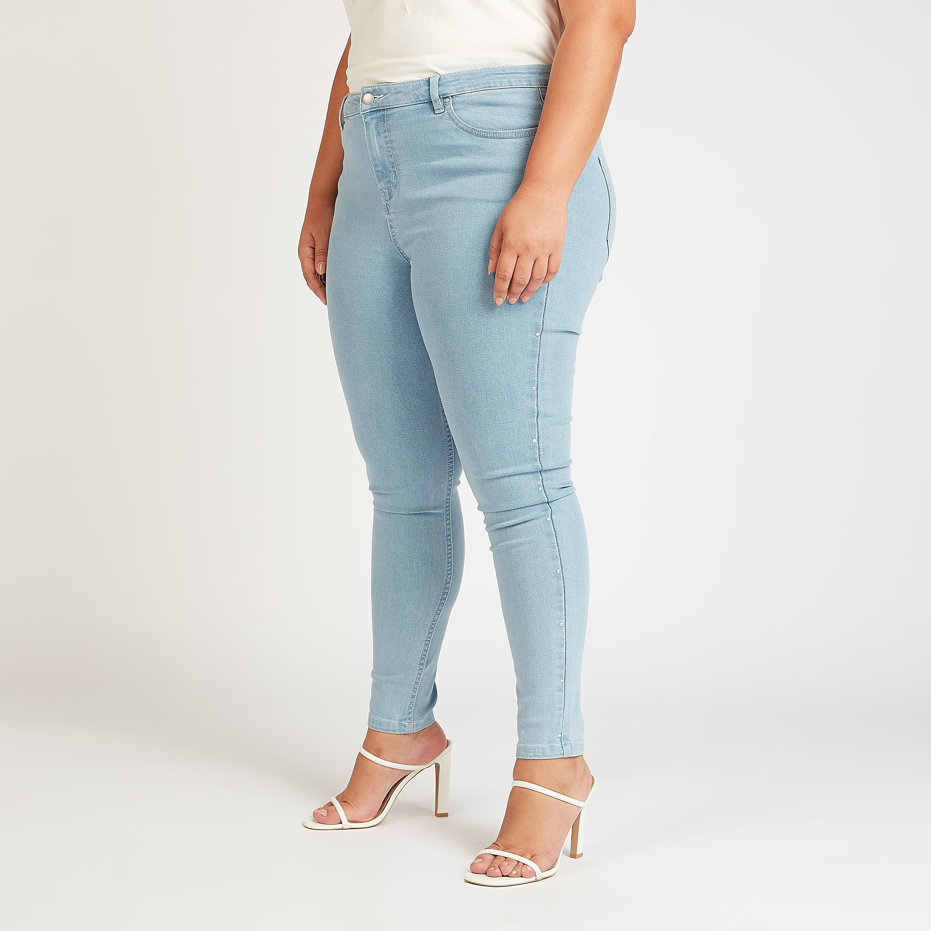 بنطلون جينز مستدام سكيني مزين بخصر متوسط الارتفاع وجيوب-women-clothing-bottoms-jeans-image-1