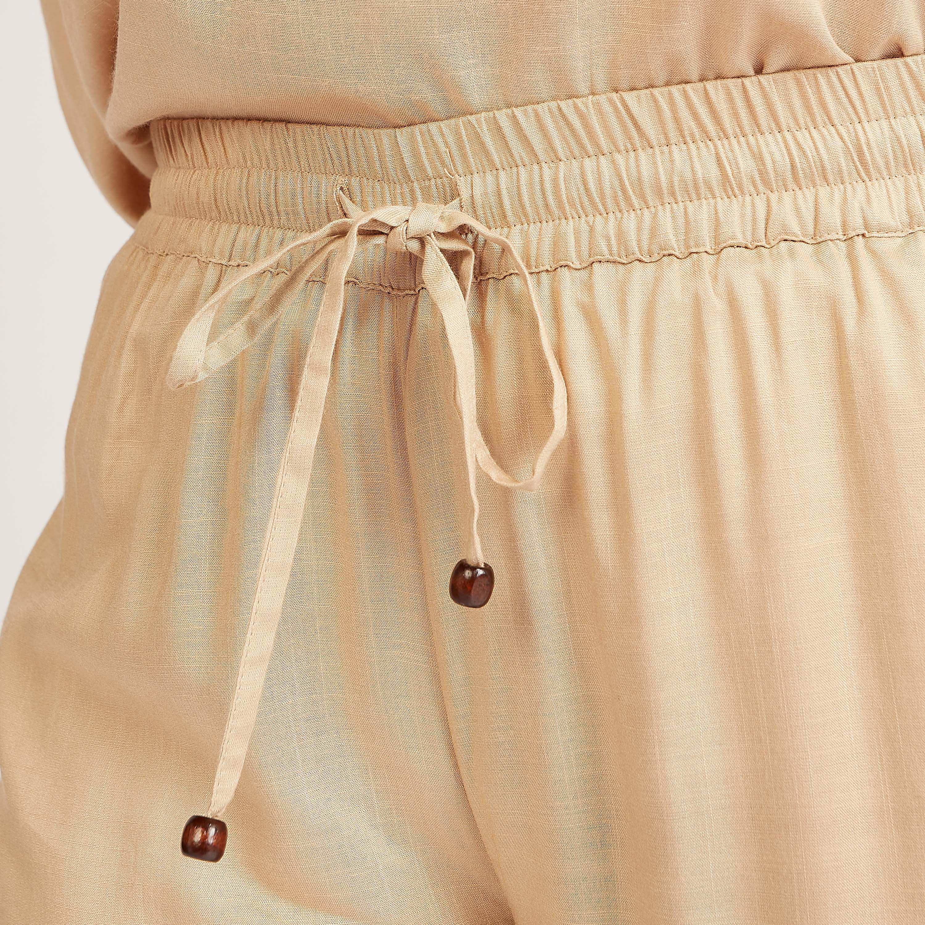 بنطلون بلازو مستدام بارز الملمس بتفاصيل جيوب ورباط-women-clothing-bottoms-trousers-image-3