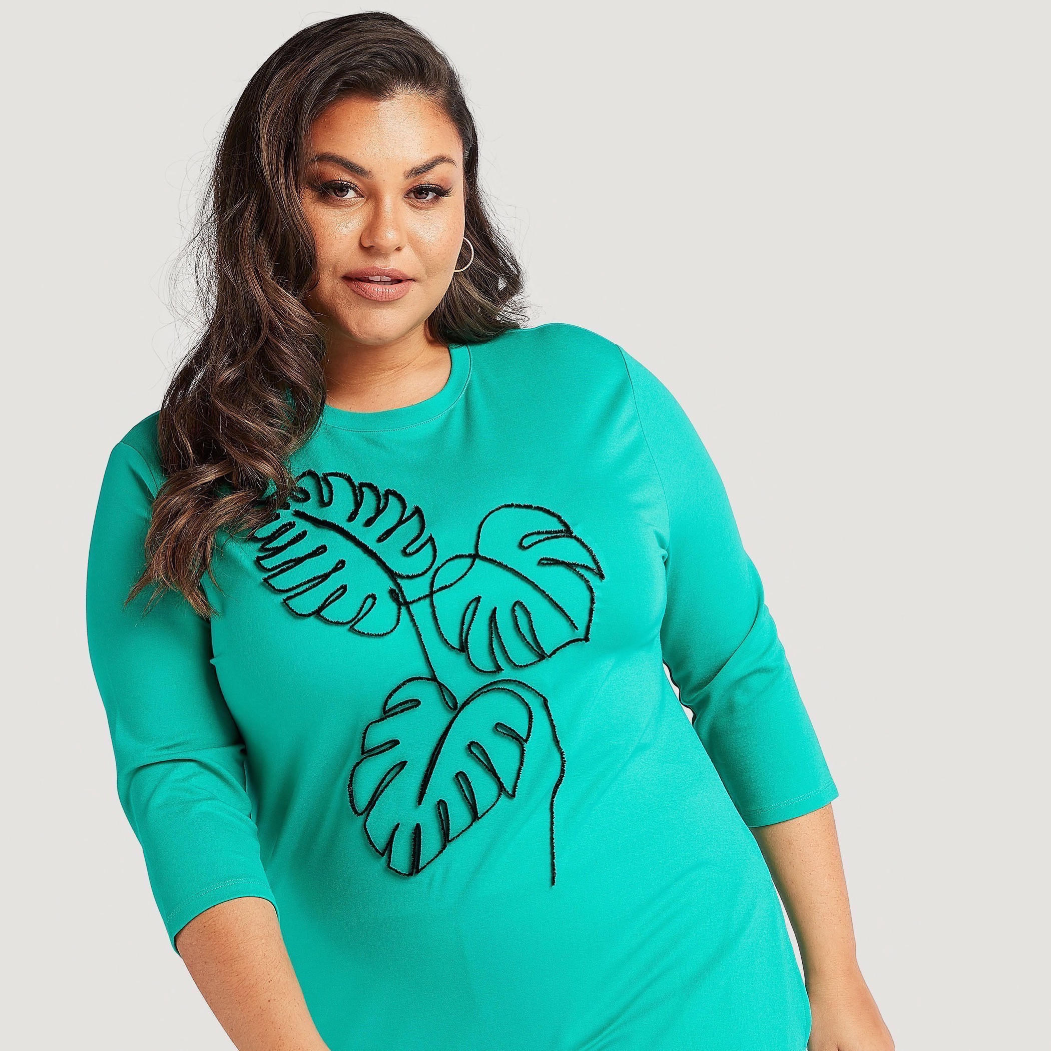 فستان ميدي واسع مطرّز بجيوب وأطراف غير مستوية-women-clothing-dresses-image-1