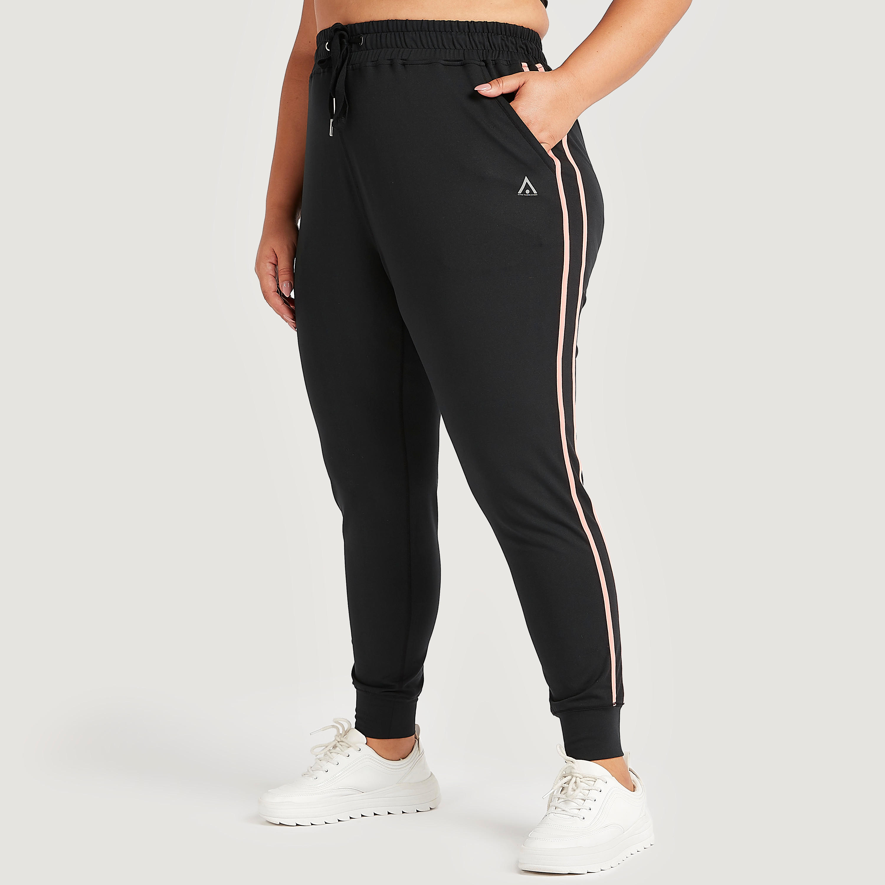 بنطلون رياضي بتفاصيل شريطة وخصر مطّاطي متوسّط الارتفاع وجيوب-women-clothing-bottoms-joggers-image-1