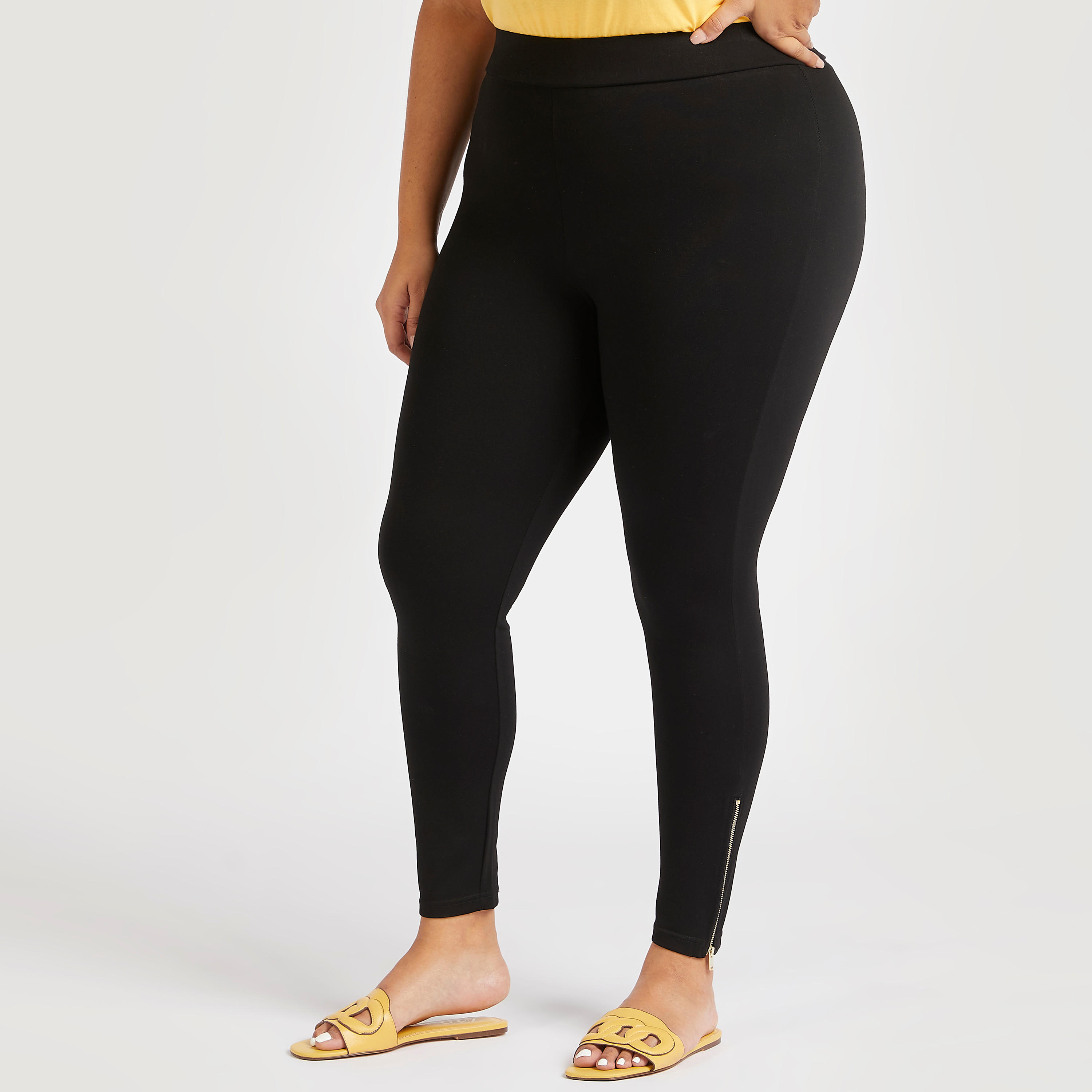 بنطلون ليقنز سادة بخصر متوسط الارتفاع وأطراف بتفاصيل سحّاب-women-clothing-bottoms-leggings-image-1