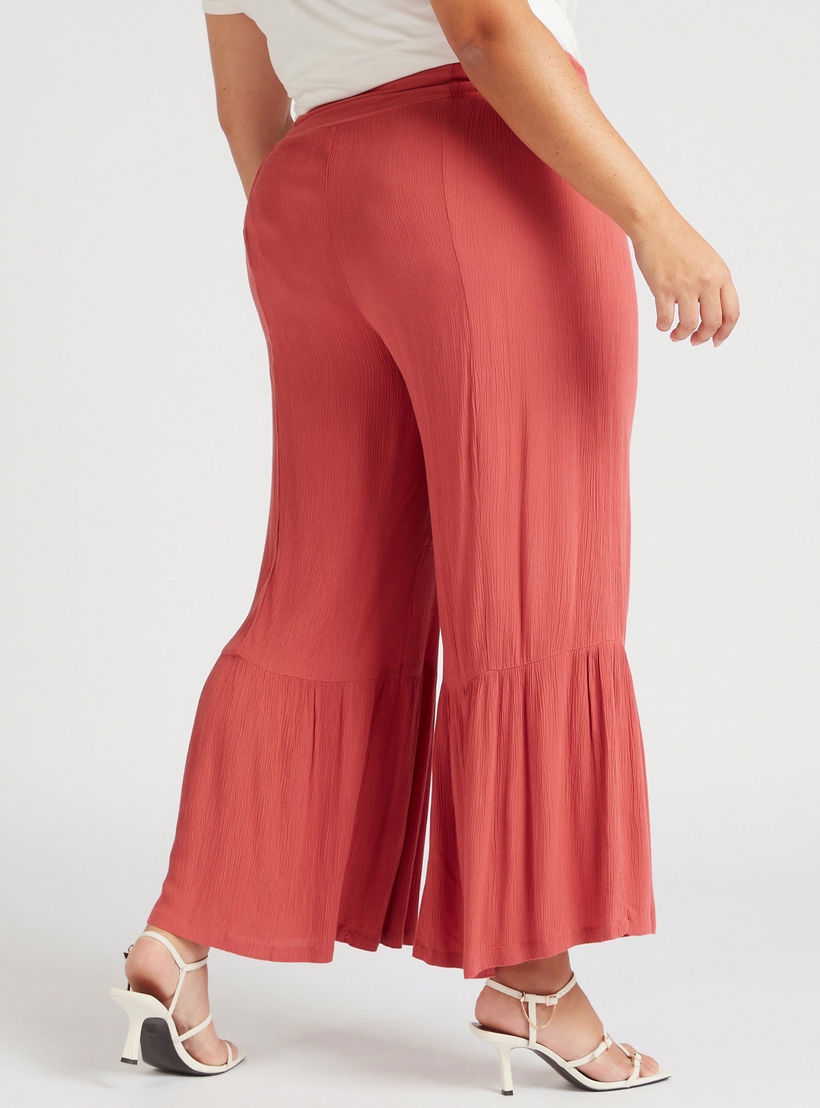 بنطلون واسع بخصر مطّاطي متوسّط الارتفاع-women-clothing-bottoms-trousers-image-1