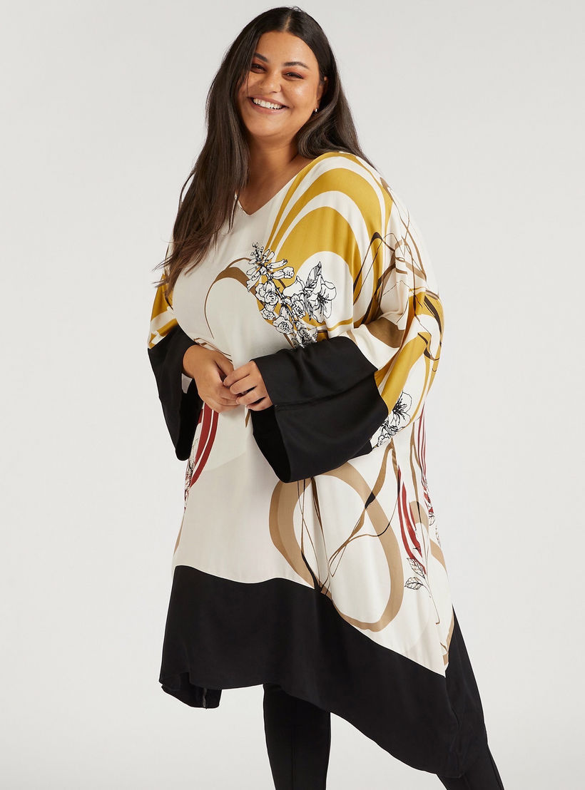 بلوزة مزّينة بنقوش تجريدية مع ياقة V وأطراف غير متماثلة-women-clothing-shirtsandblouses-blouses-image-5