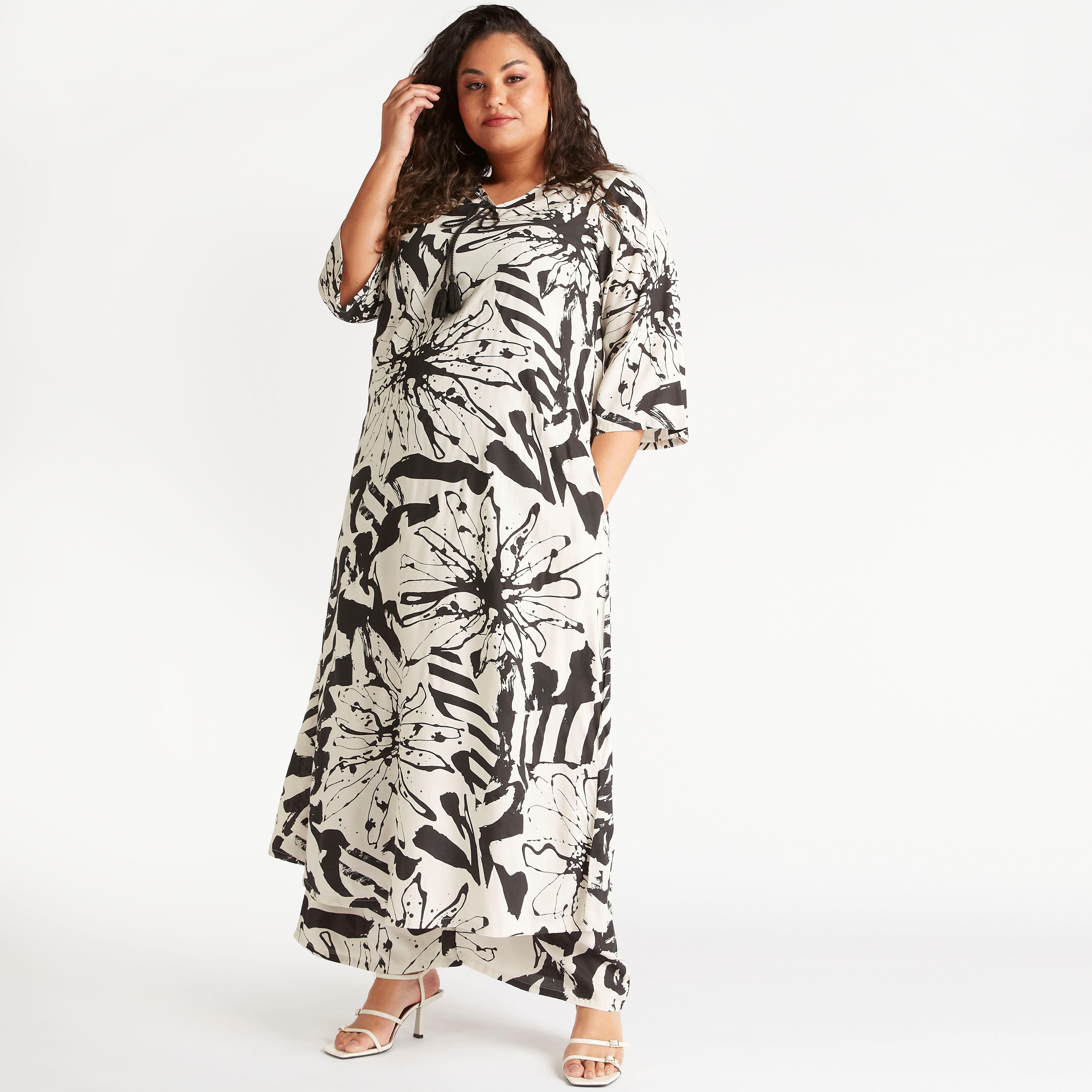 فستان طويل إيه لاين بأربطة مزينة بشرّابات وطبعات زهرية-women-clothing-dresses-image-2