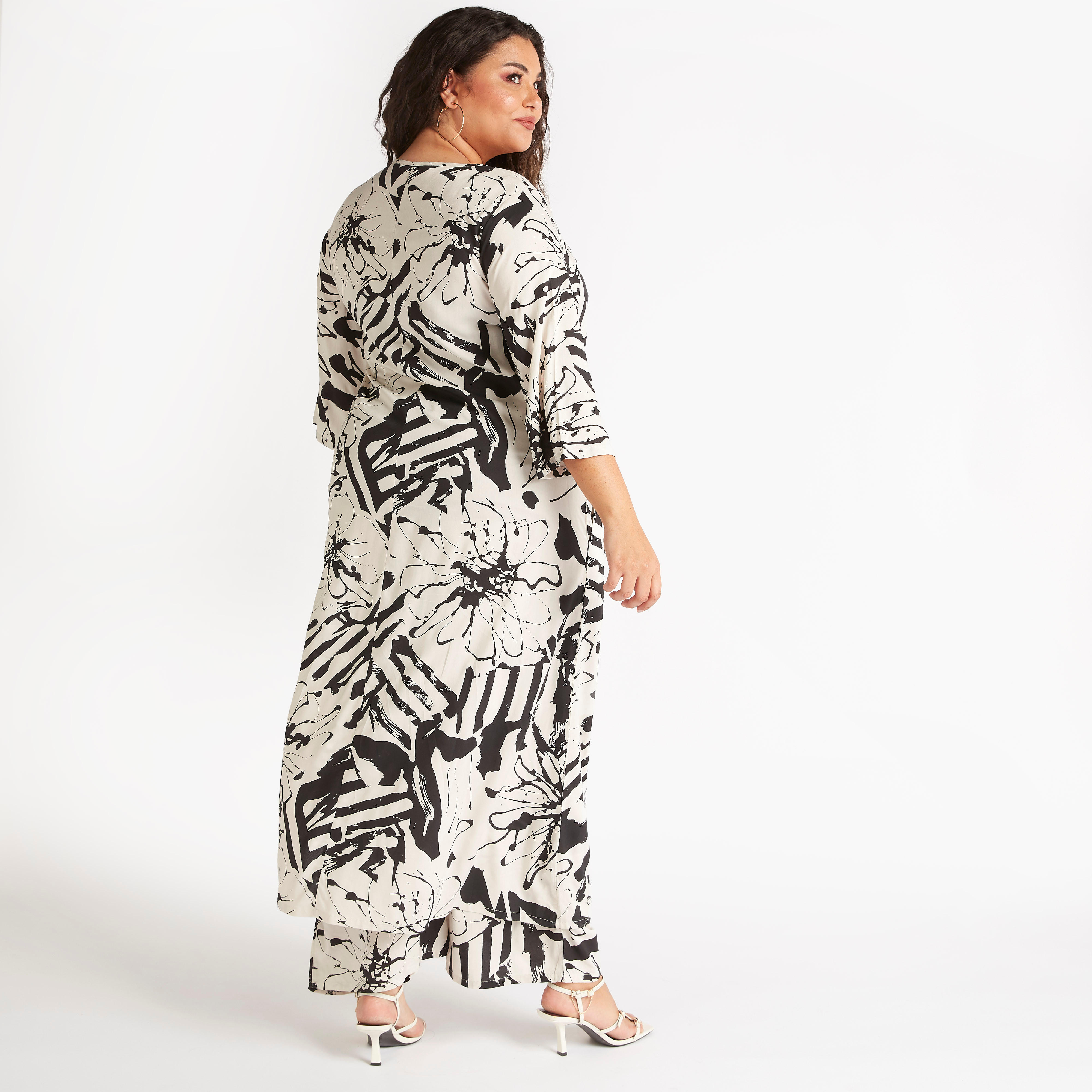 فستان طويل إيه لاين بأربطة مزينة بشرّابات وطبعات زهرية-women-clothing-dresses-image-5
