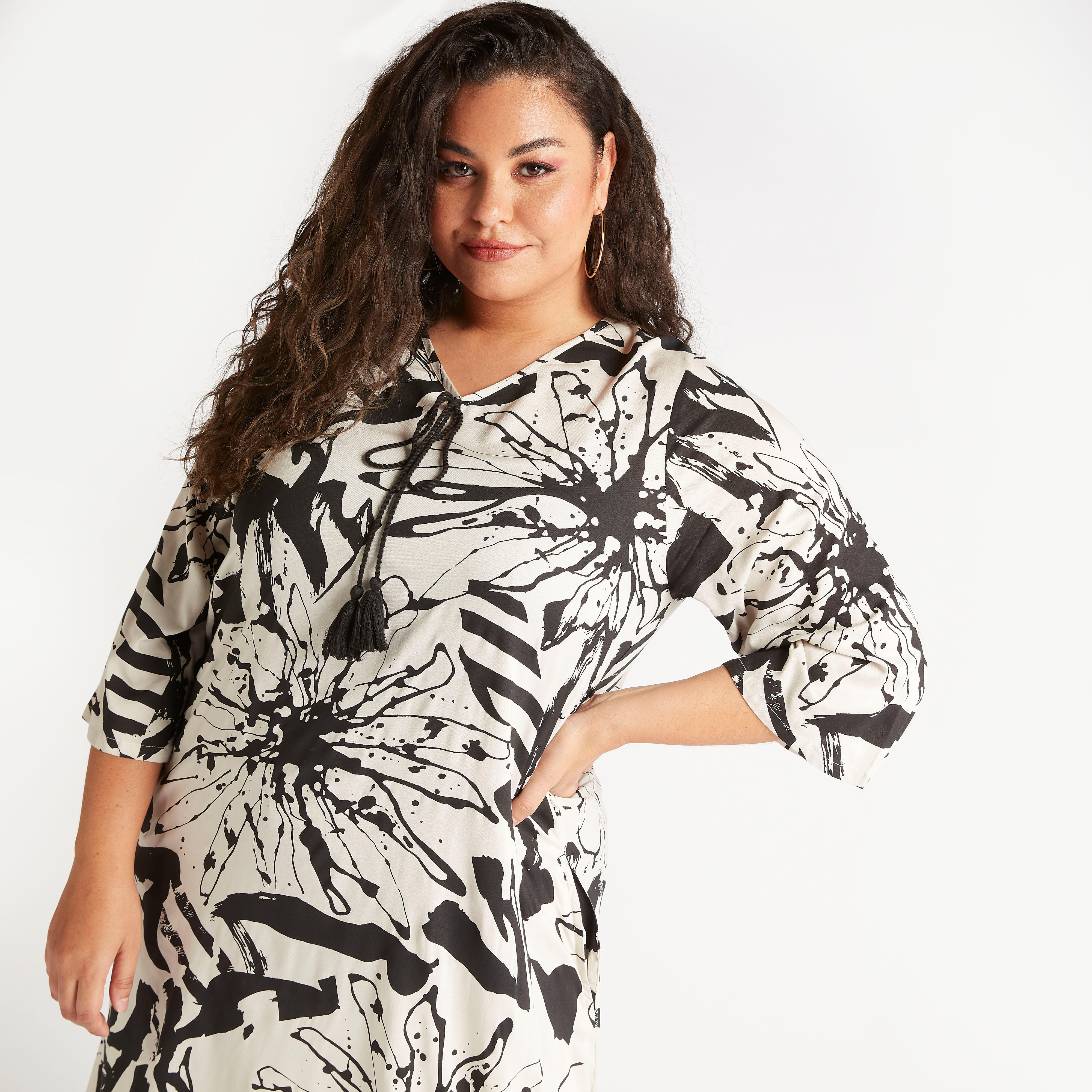 فستان طويل إيه لاين بأربطة مزينة بشرّابات وطبعات زهرية-women-clothing-dresses-image-6