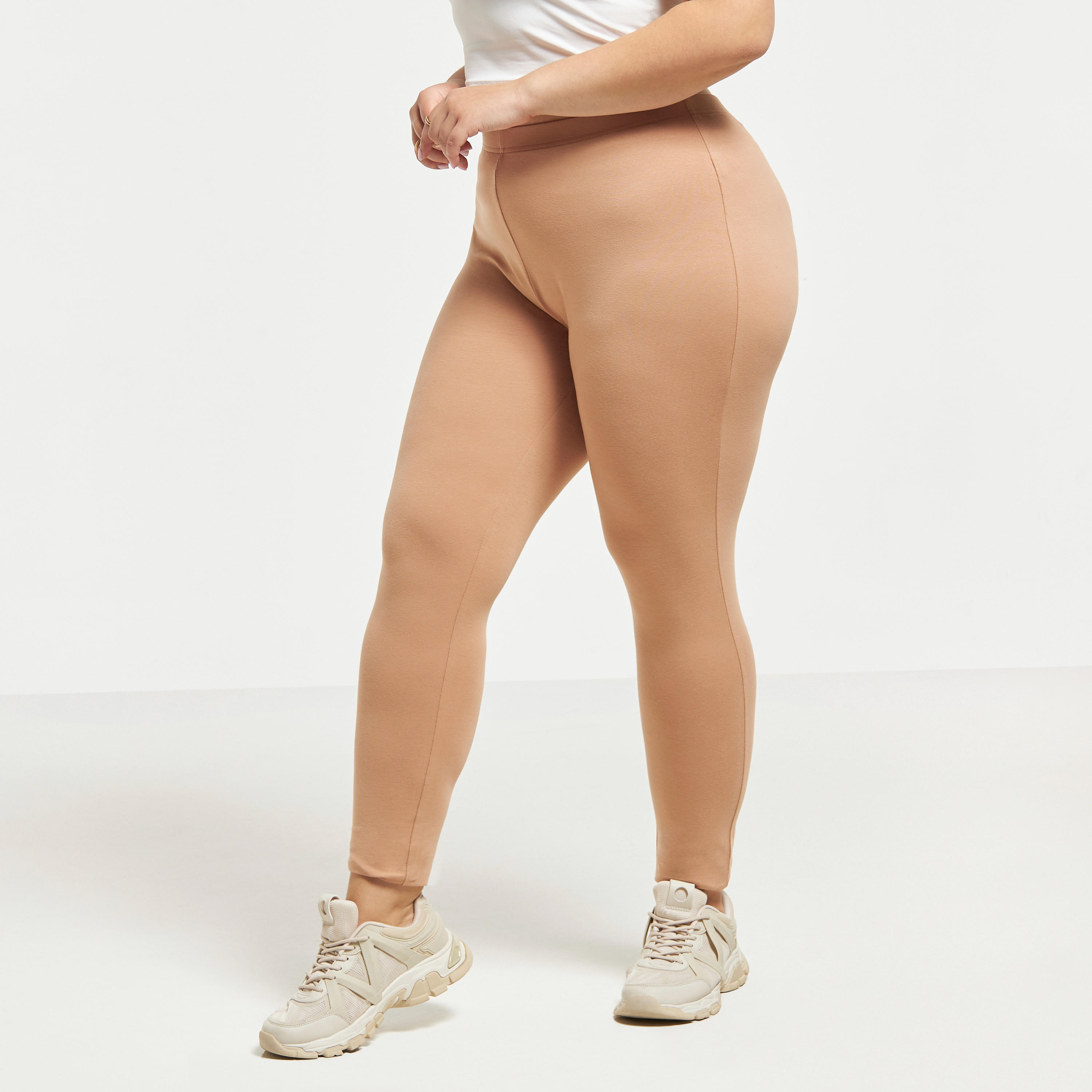 بنطلون ليقنز مقاس كبير سادة بقصّة سكيني وخصر مطاطي-women-clothing-bottoms-leggings-image-1