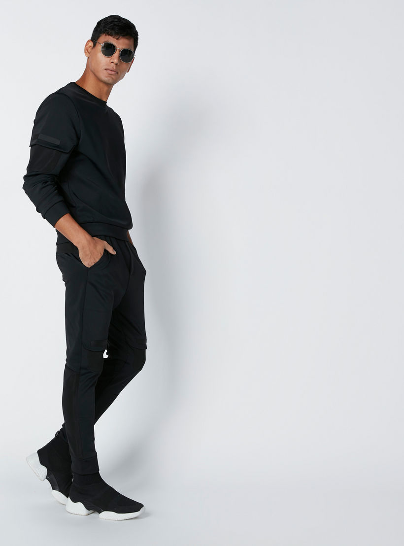 بنطال رياضي بخصر مطّاطي وجيوب-men-clothing-bottoms-joggers-image-3