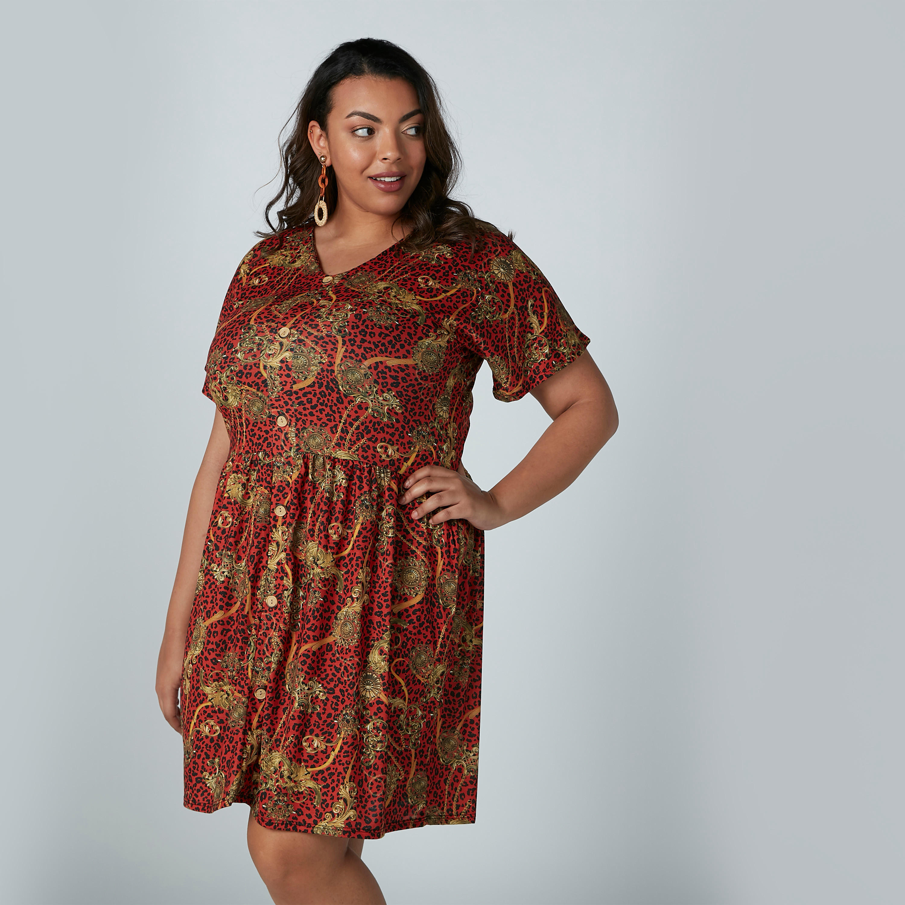فستان ميدي بطبعات وياقة v وأكمام قصيرة-women-clothing-dresses-image-1