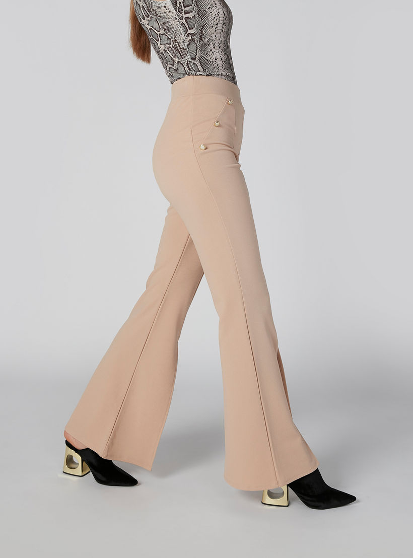 بنطلون مرن سادة بخصر مطاطي مع شق و زينة-women-clothing-bottoms-trousers-image-3
