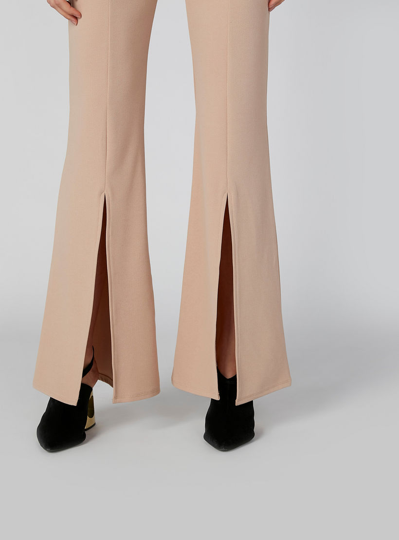 بنطلون مرن سادة بخصر مطاطي مع شق و زينة-women-clothing-bottoms-trousers-image-2