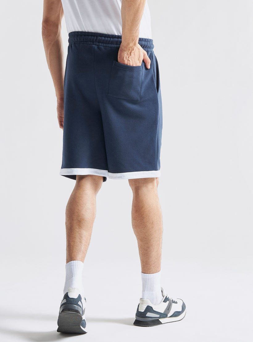 شورت رياضي بخصر مطاطي وجيوب وطبعات شعار جامعة ييل-men-clothing-bottoms-shorts-image-3