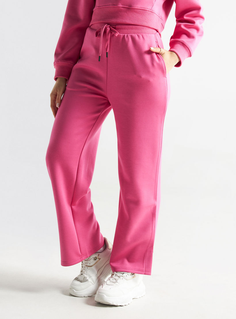بنطلون سادة بقصّة مريحة ورباط إغلاق وجيوب-women-clothing-bottoms-trousers-image-4