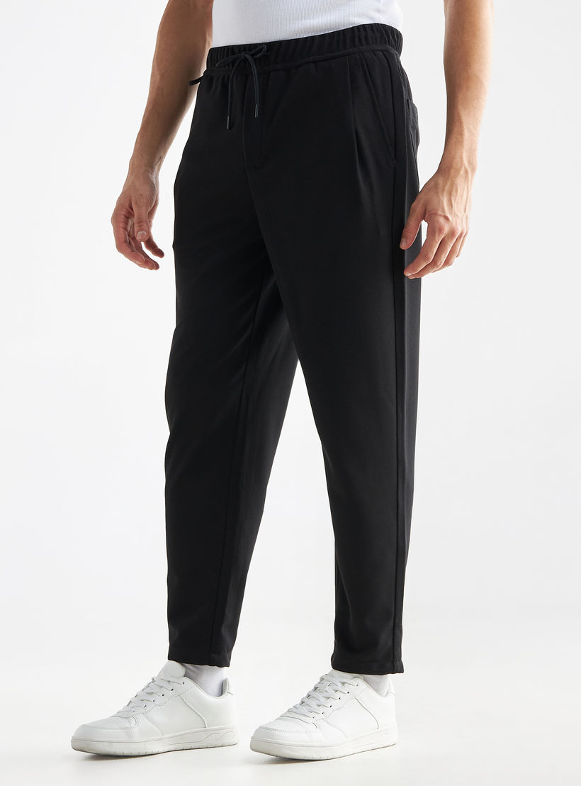 بنطلون رياضي بخصر مرن وجيوب-men-clothing-bottoms-joggers-image-4