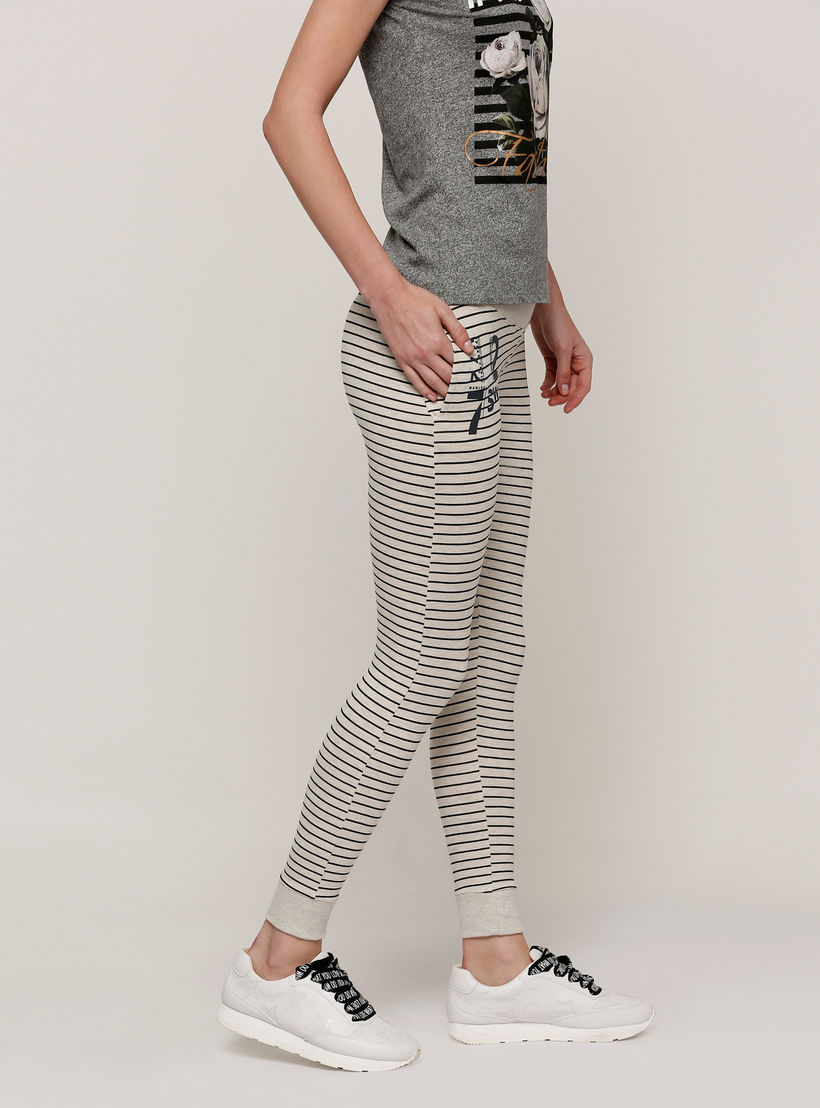 بنطال رياضي طويل بجيوب وطبعات سمايلي وورلد-women-clothing-bottoms-joggers-image-3