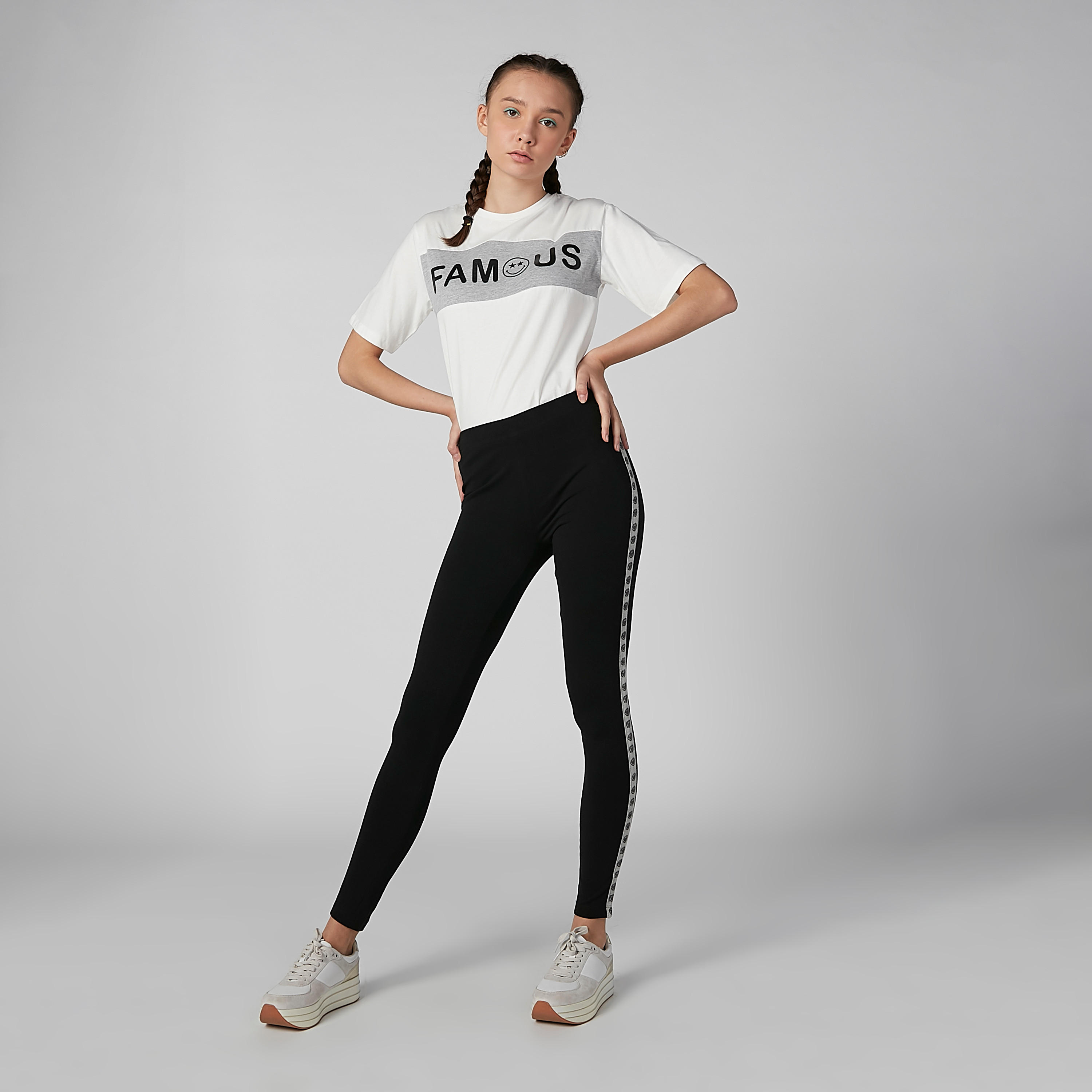 بنطال ليقنز بخصر مطّاطي وطبعات سمايلي وورلد-women-clothing-bottoms-leggings-image-1