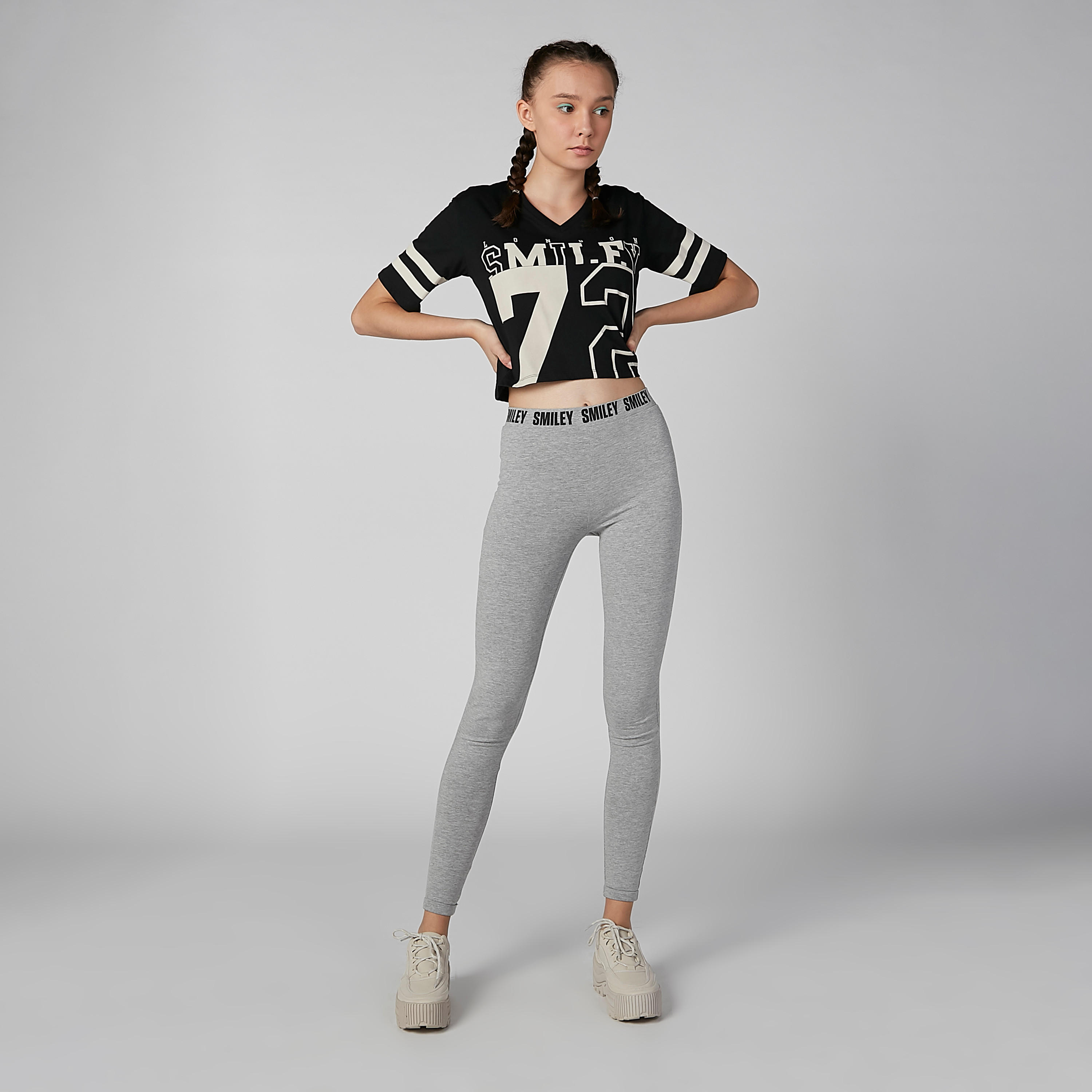 بنطال ليقنز سادة بخصر مطّاطي وطبعات سمايلي وورلد-women-clothing-bottoms-leggings-image-5