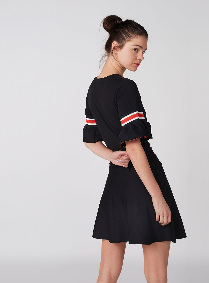 تنورة واسعة وقصيرة بثنيات-women-clothing-bottoms-skirts-image-4