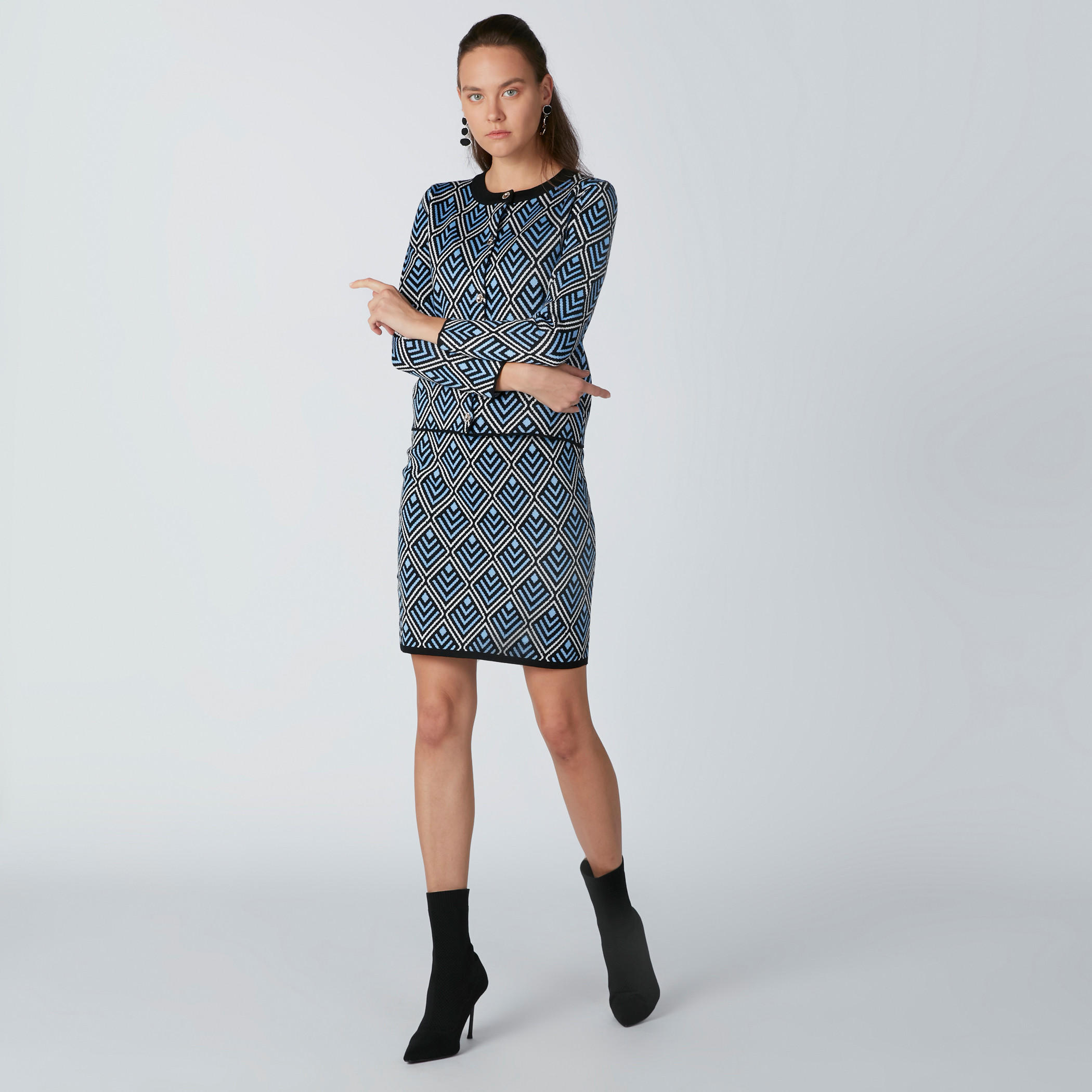 تنورة قصيرة ضيّقة بخصر مطّاطي وطبعات-women-clothing-bottoms-skirts-image-1