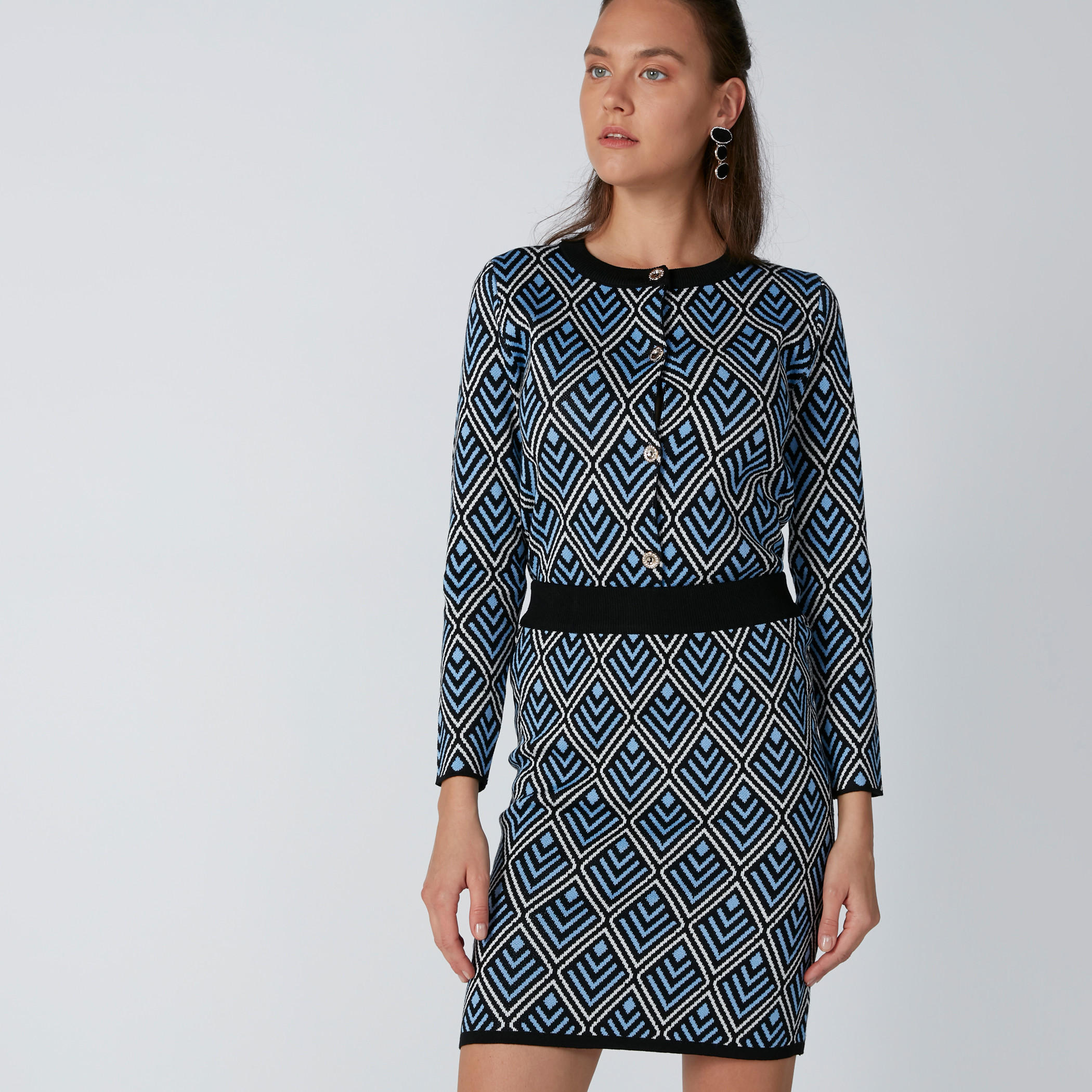 تنورة قصيرة ضيّقة بخصر مطّاطي وطبعات-women-clothing-bottoms-skirts-image-3