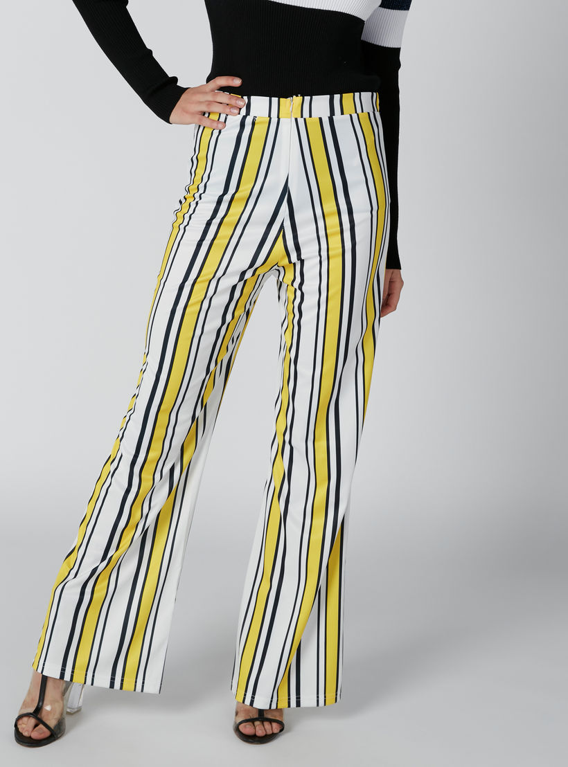 بنطال مقلّم بقصّة واسعة وخصر مطاطي-women-clothing-bottoms-trousers-image-1