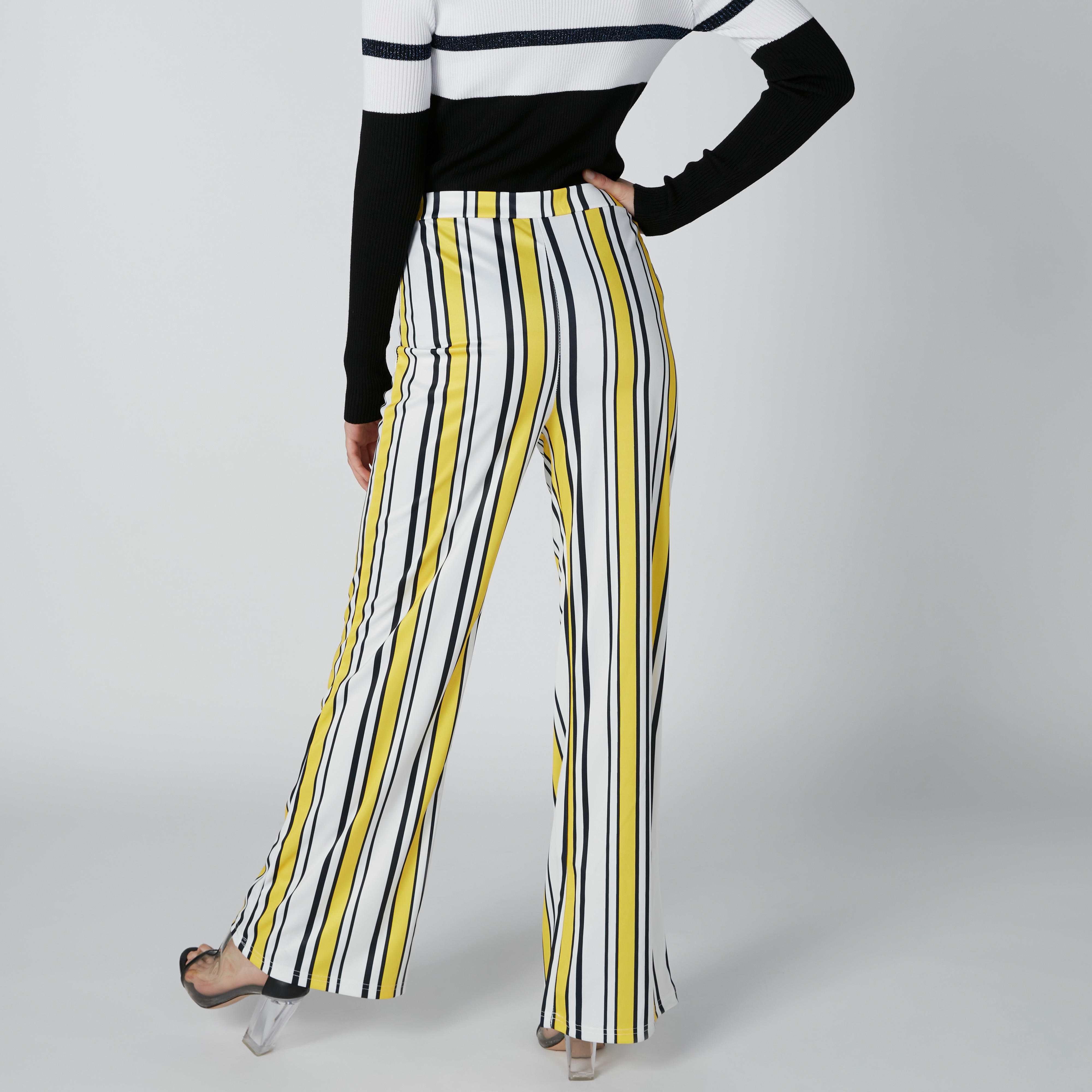 بنطال مقلّم بقصّة واسعة وخصر مطاطي-women-clothing-bottoms-trousers-image-2