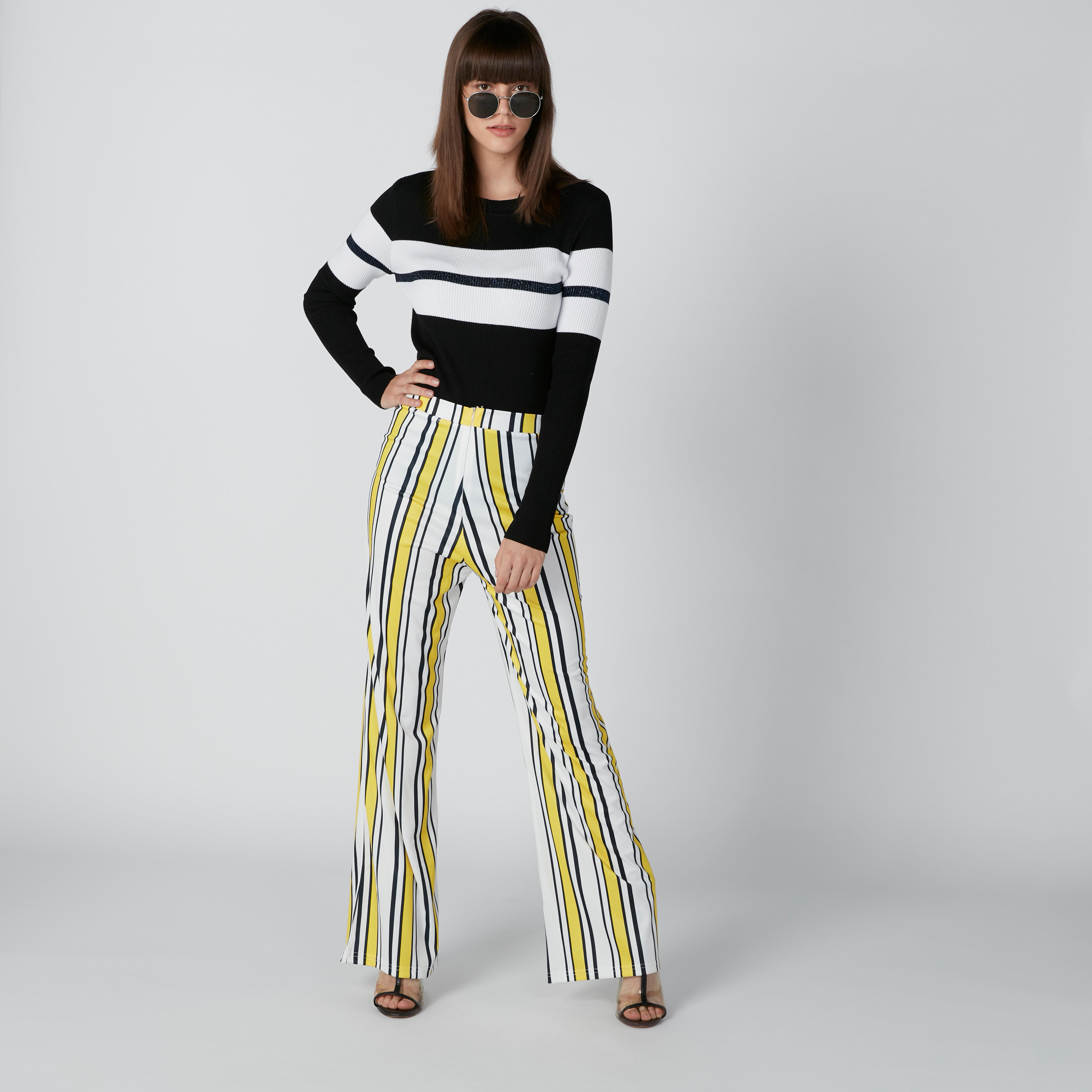 بنطال مقلّم بقصّة واسعة وخصر مطاطي-women-clothing-bottoms-trousers-image-3