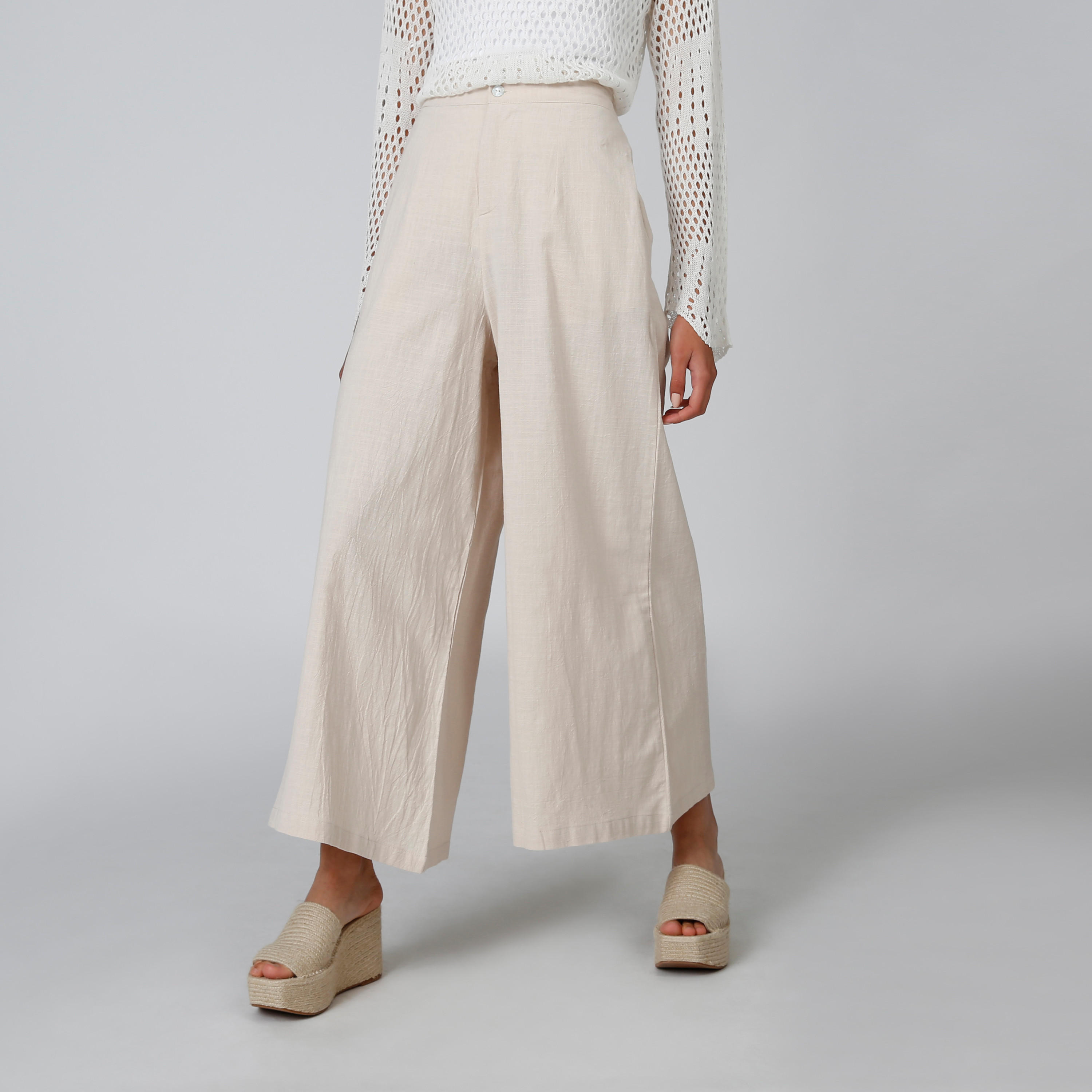 بنطلون بالازو سادة بقصّة واسعة وخصر متوسط الارتفاع وجيوب-women-clothing-bottoms-trousers-image-1