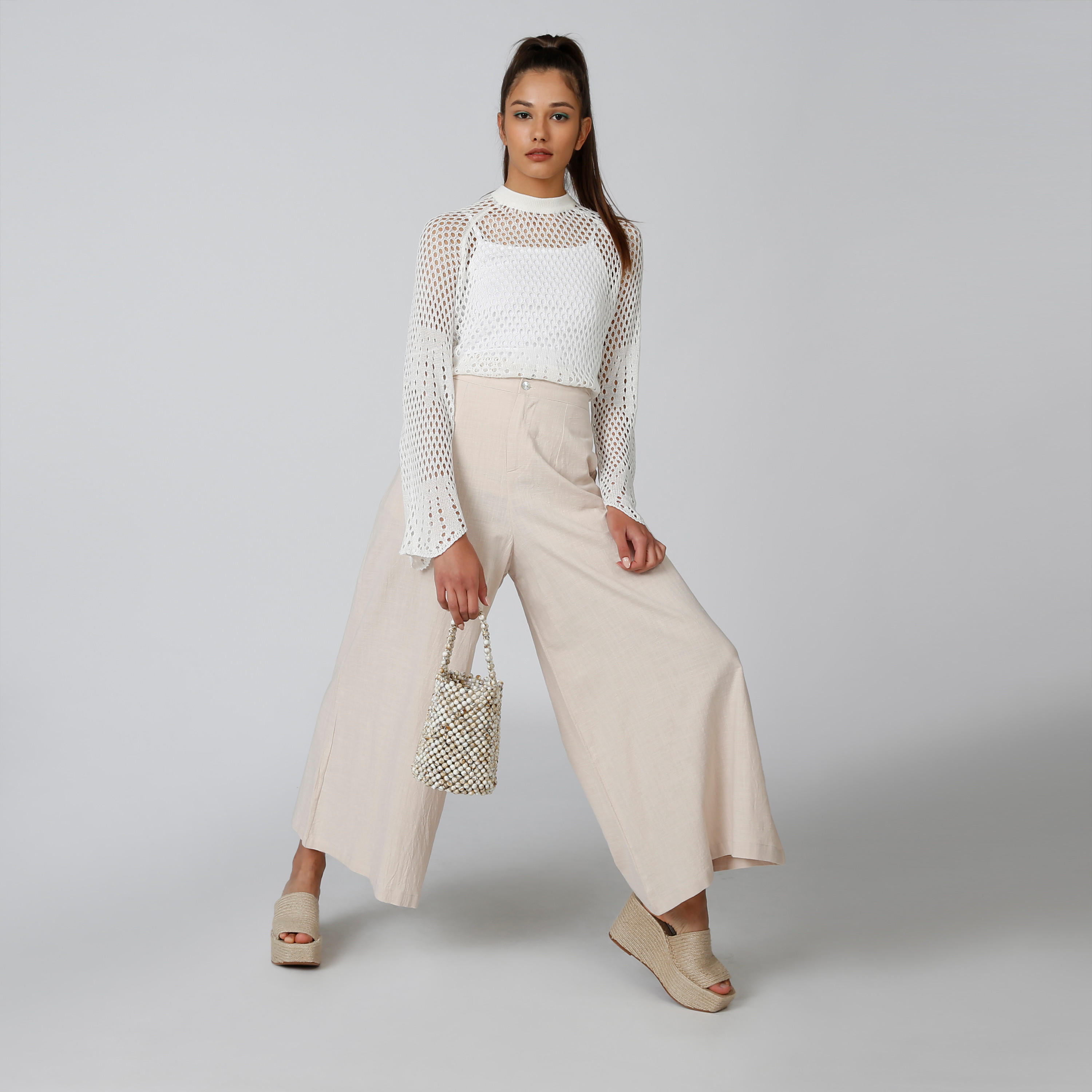 بنطلون بالازو سادة بقصّة واسعة وخصر متوسط الارتفاع وجيوب-women-clothing-bottoms-trousers-image-3