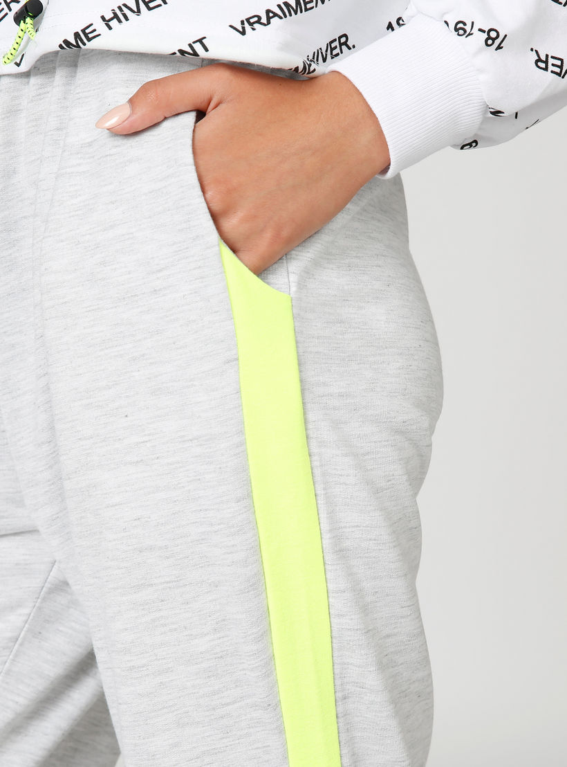 بنطلون سادة بخصر مرن وجيوب وشريطة-women-clothing-bottoms-trousers-image-4