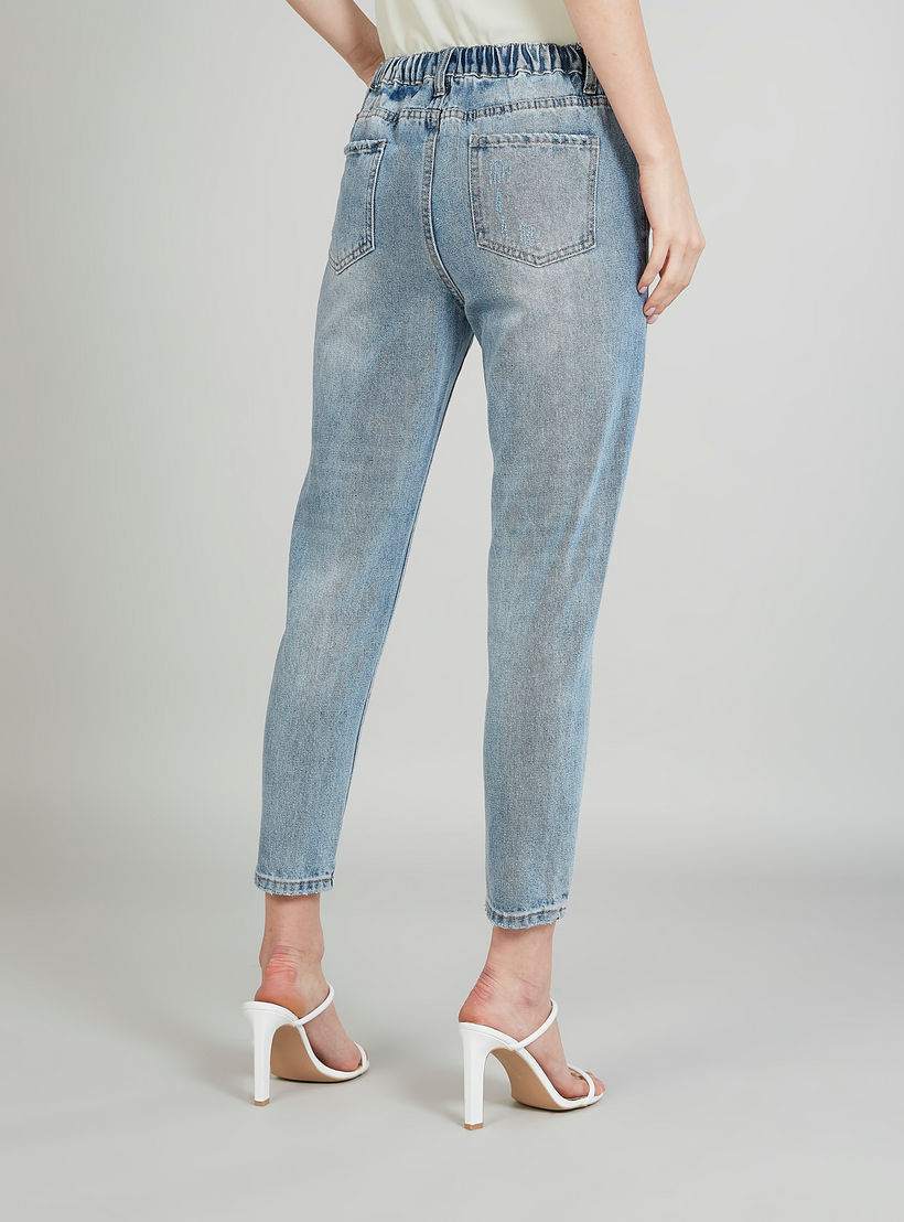 بنطلون سادة بخصر متوسّط الارتفاع بتفاصيل جيوب وعراوي-women-clothing-bottoms-jeans-image-4